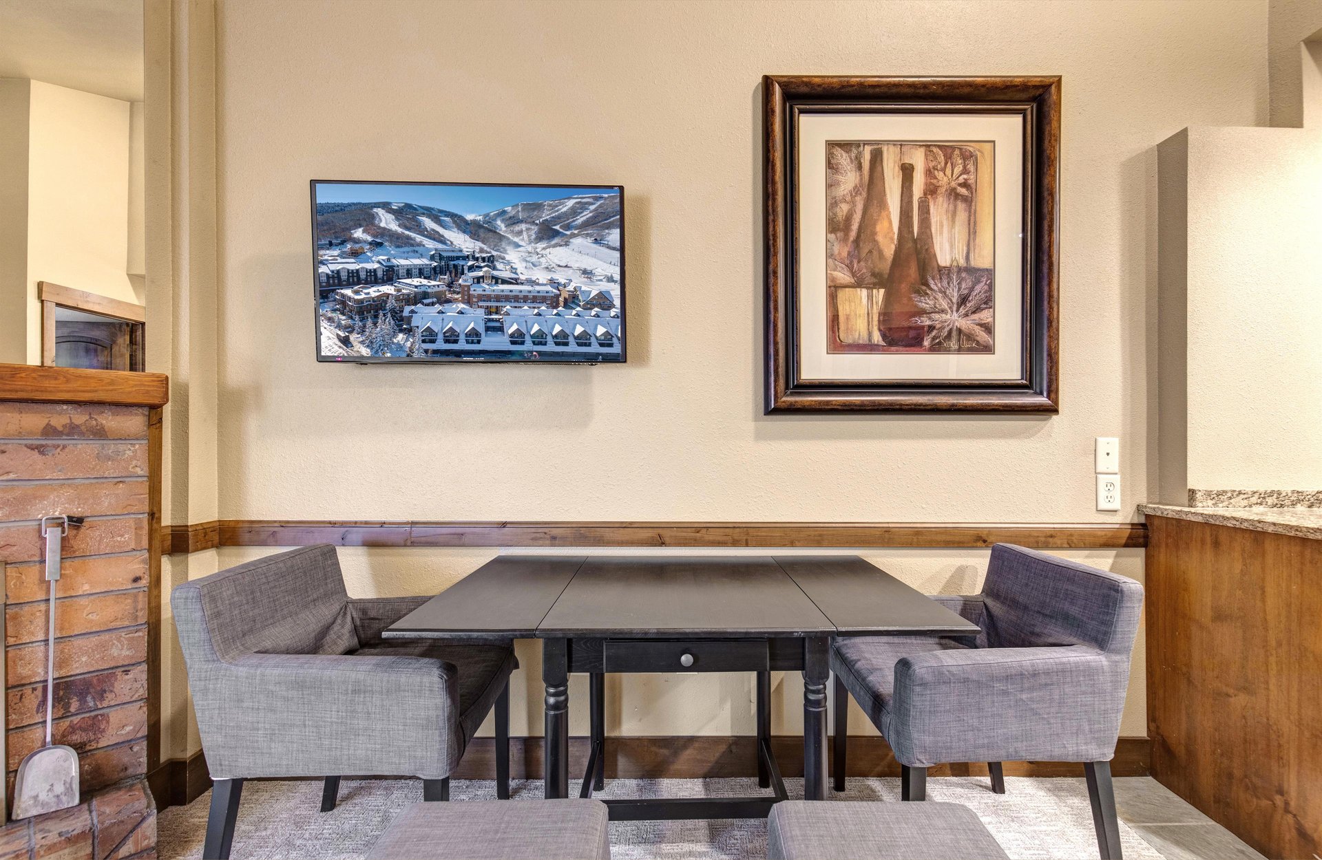 Your cozy dining nook features a stylish expandable table and comfortable seating.