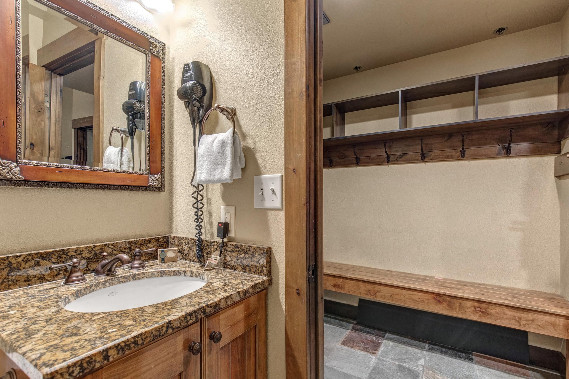 Your private bathroom features granite counters and hair dryer, plus custom storage closet for your belongings.