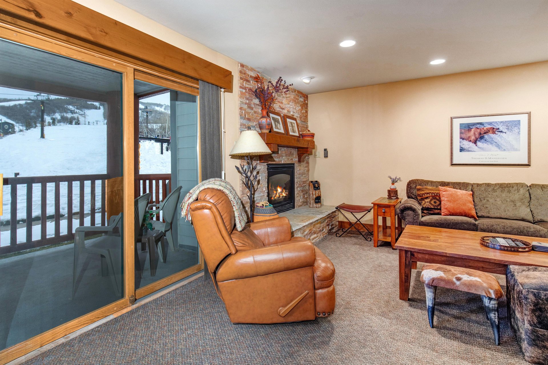 Sink into plush leather chair or upholstered couch by your the fireplace.