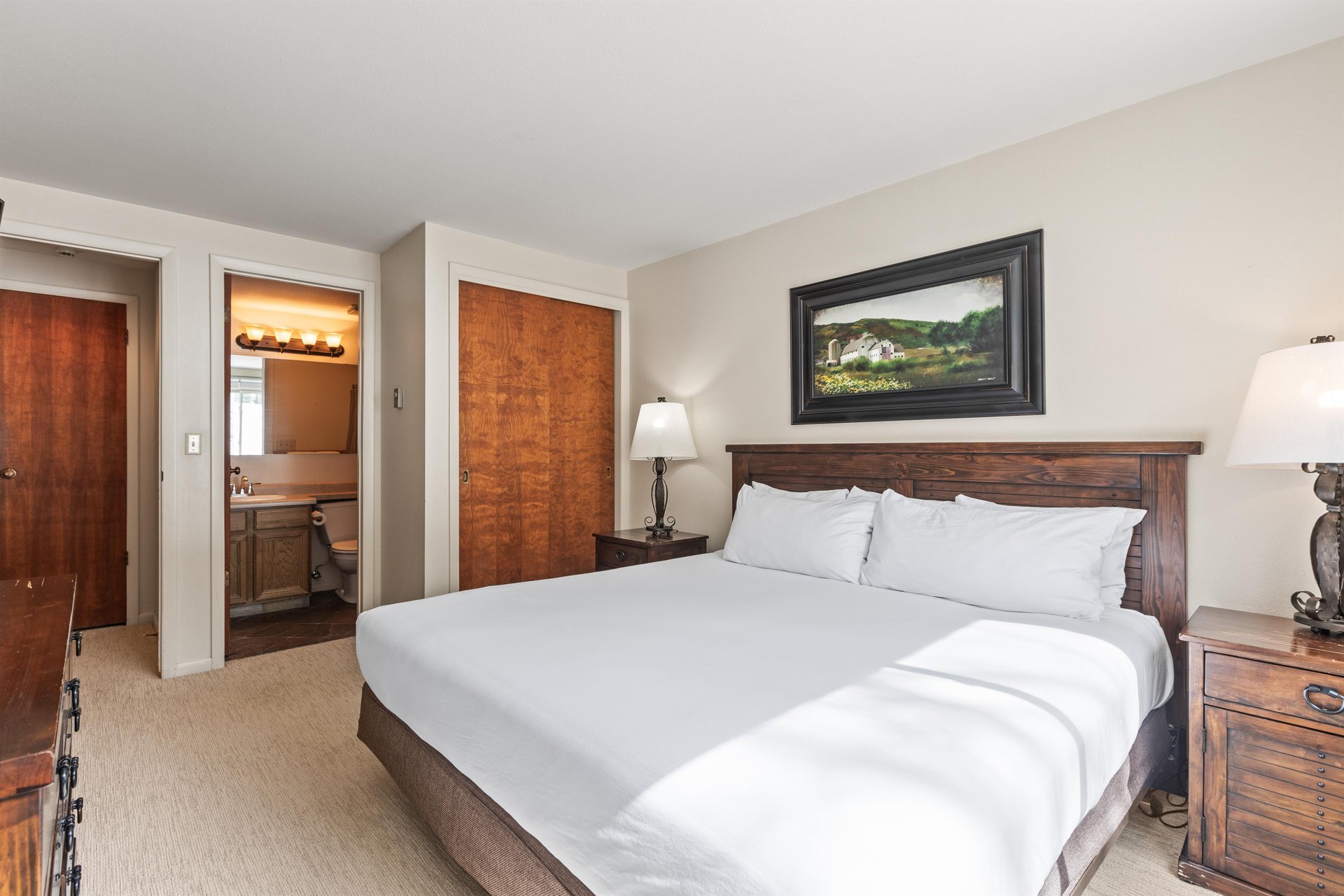 Snow Flower Condominium 147s main suite with bathroom entrance and closet.