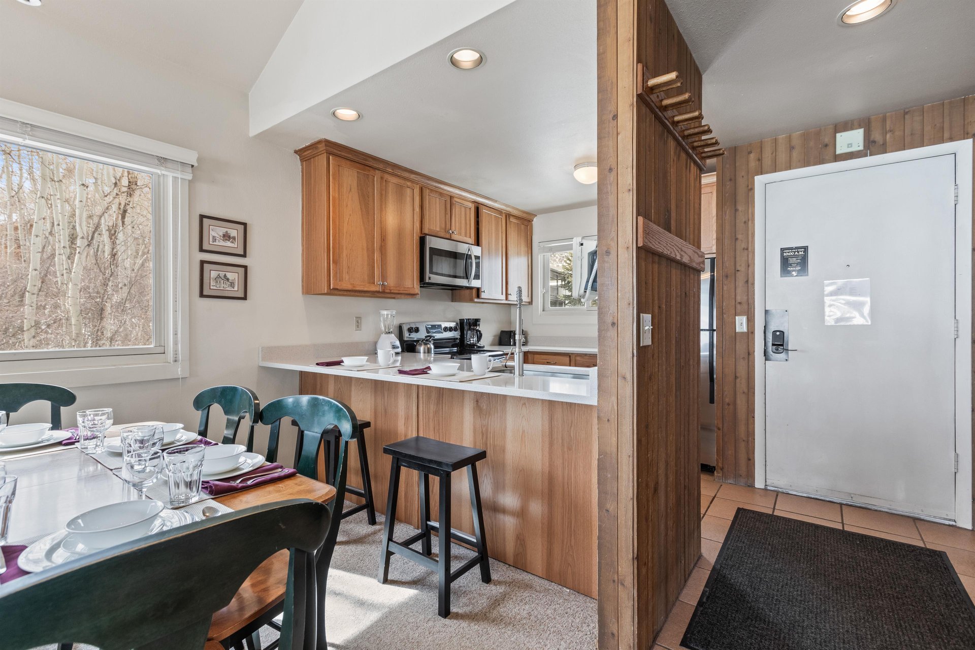 Premier Snow Flower Condominium 130s breakfast bar with seating for 2 guests.