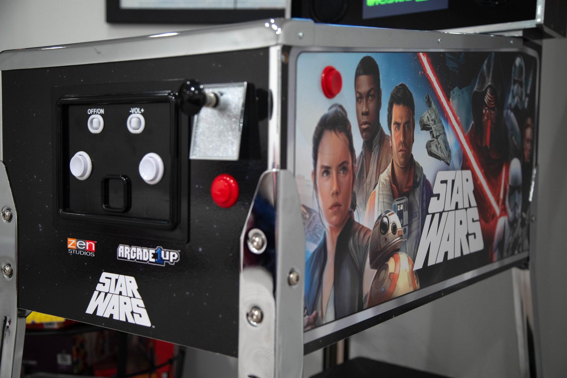 Challenge friends to epic battles with this vintage Star Wars pinball machine in the game room.