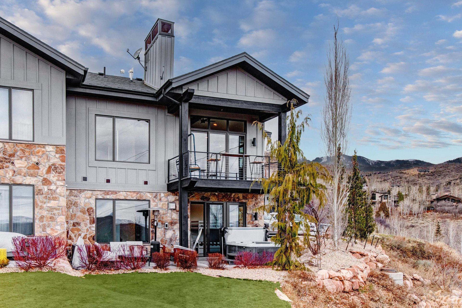 Frost Haven is a modern mountain retreat in Canyons Village with stone accents and views.