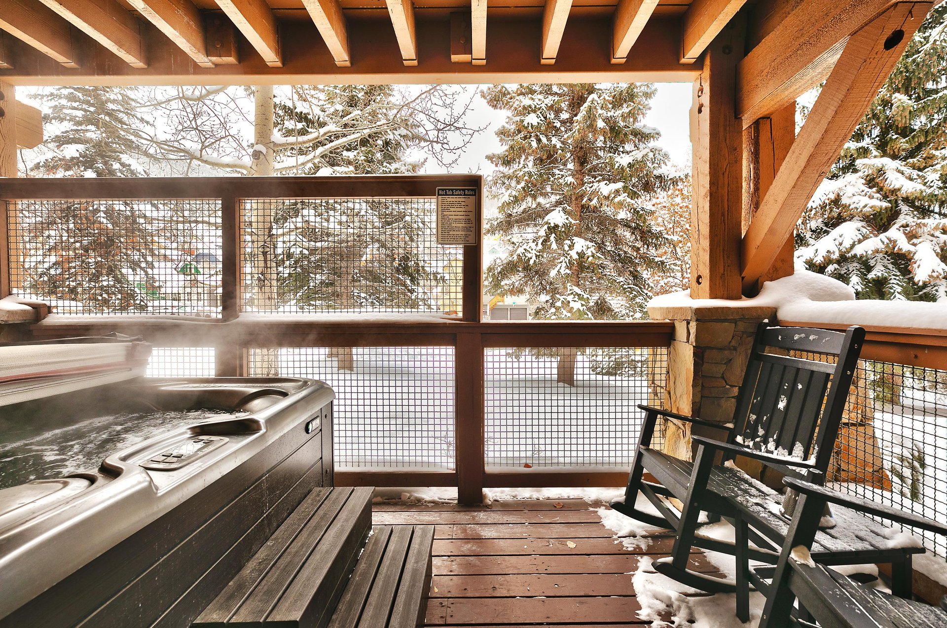 Enjoy your own private hot tub on the deck overlooking the mountain