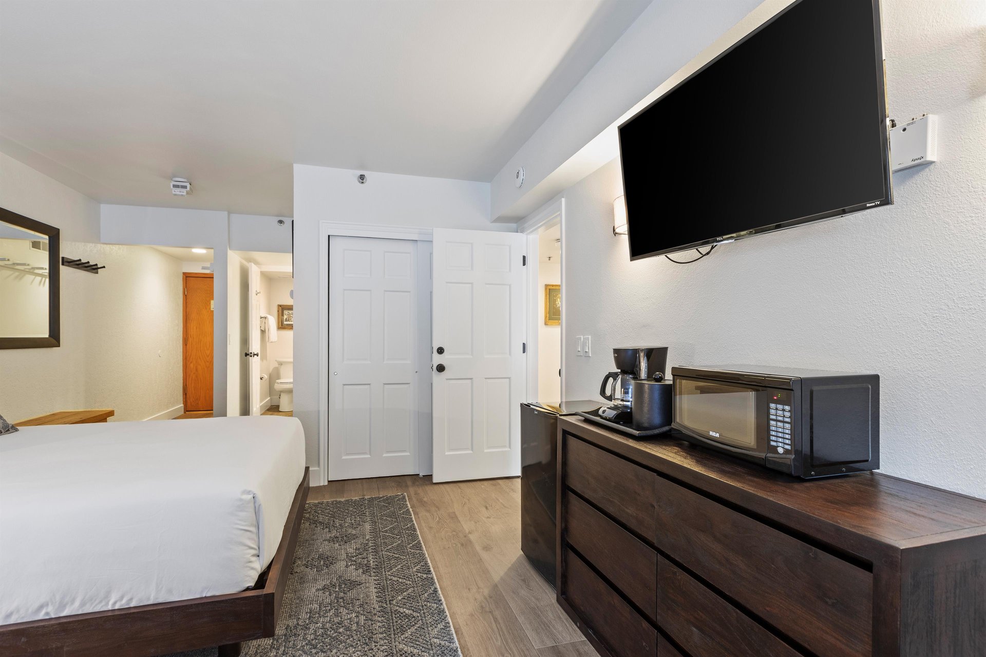 This hotel style room that offers two queen size beds and coffee maker and microwave..