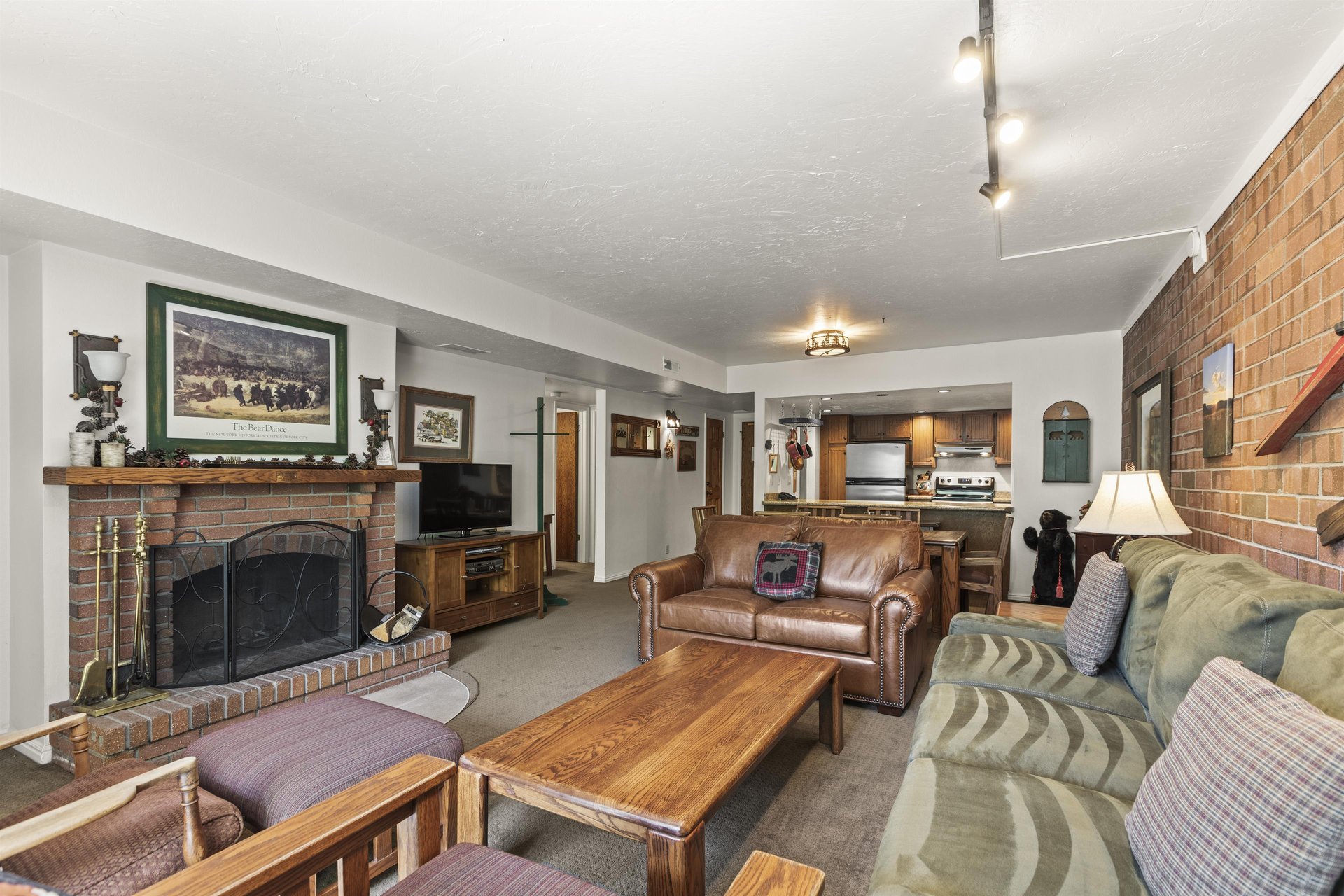 Park Station 121 has a living room with comfortable furnishings and wood burning fireplace.