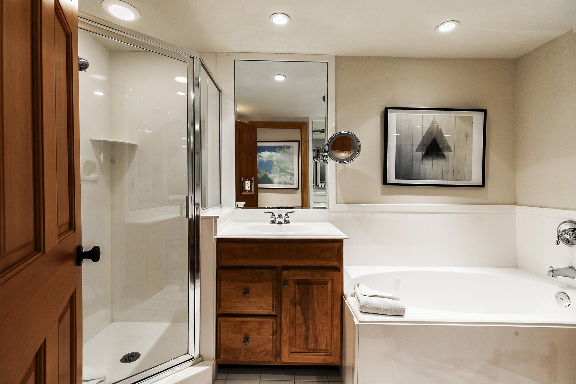 Shared guest bath includes a shower and separate tub