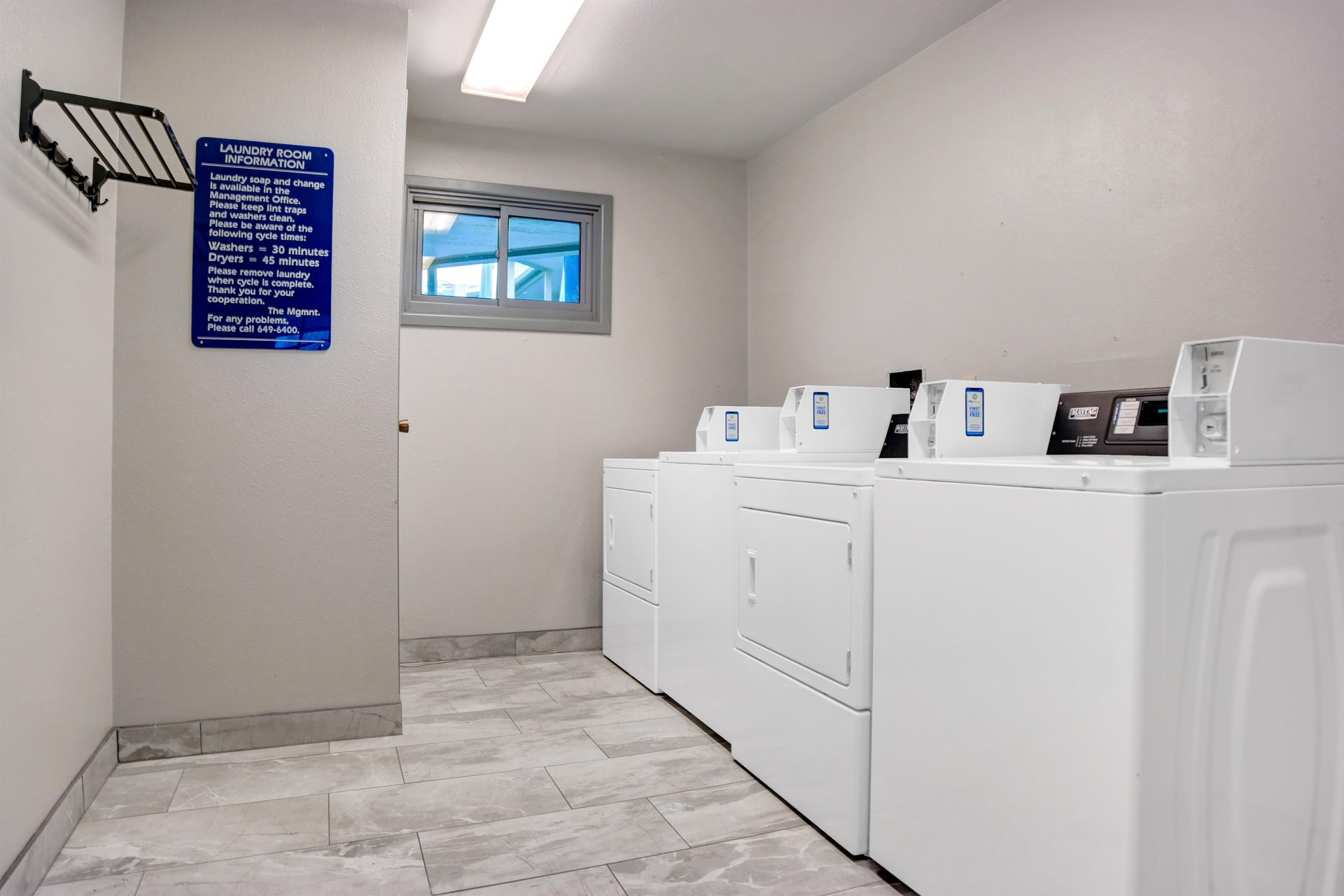 Common laundry room located on the second  third floors. Machines accept both coin payment and credit card via smartphone app