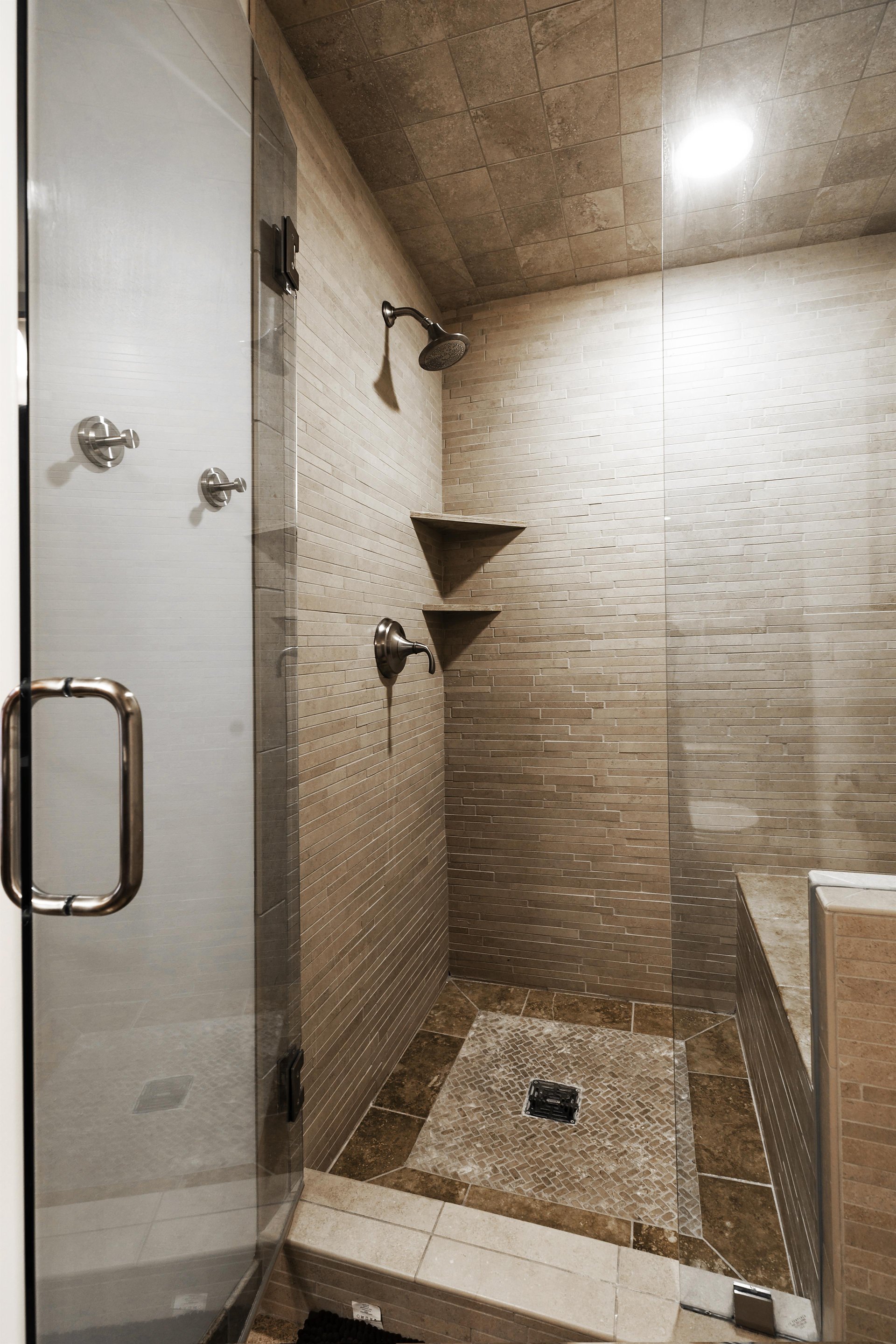 Guest walk in shower with glass door