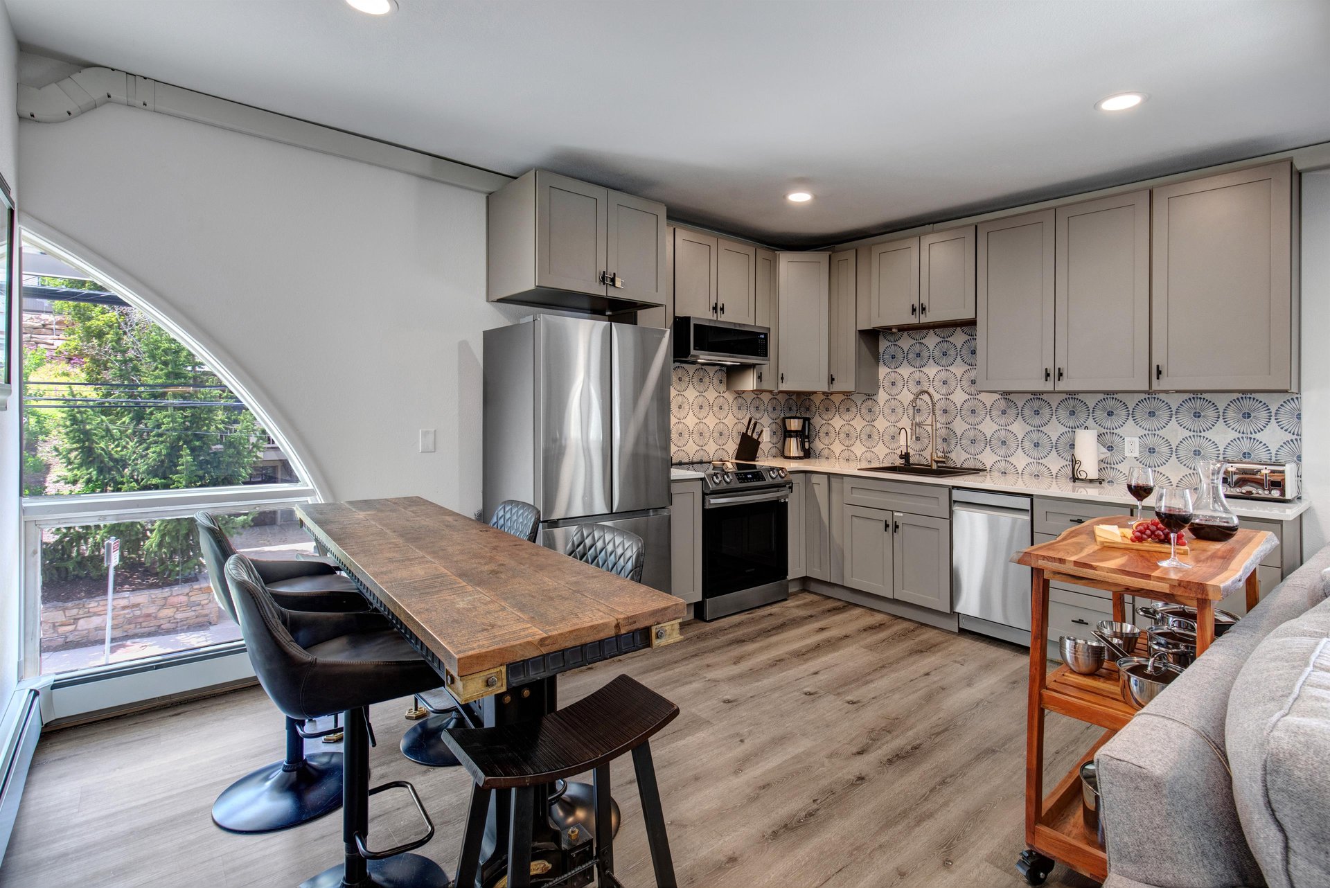 The open concept floor plan  kitchen, dining area, and living area.