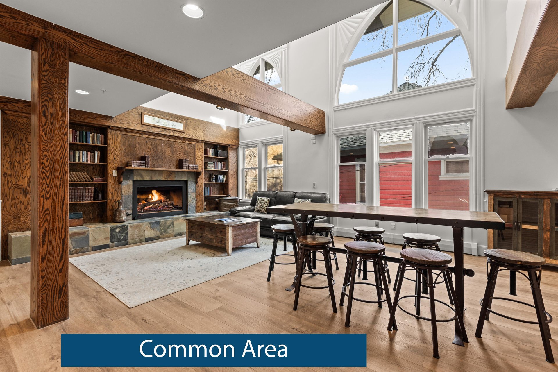 Unwind in this stunning common area where rustic wood beams meet modern comfort by the crackling fire.