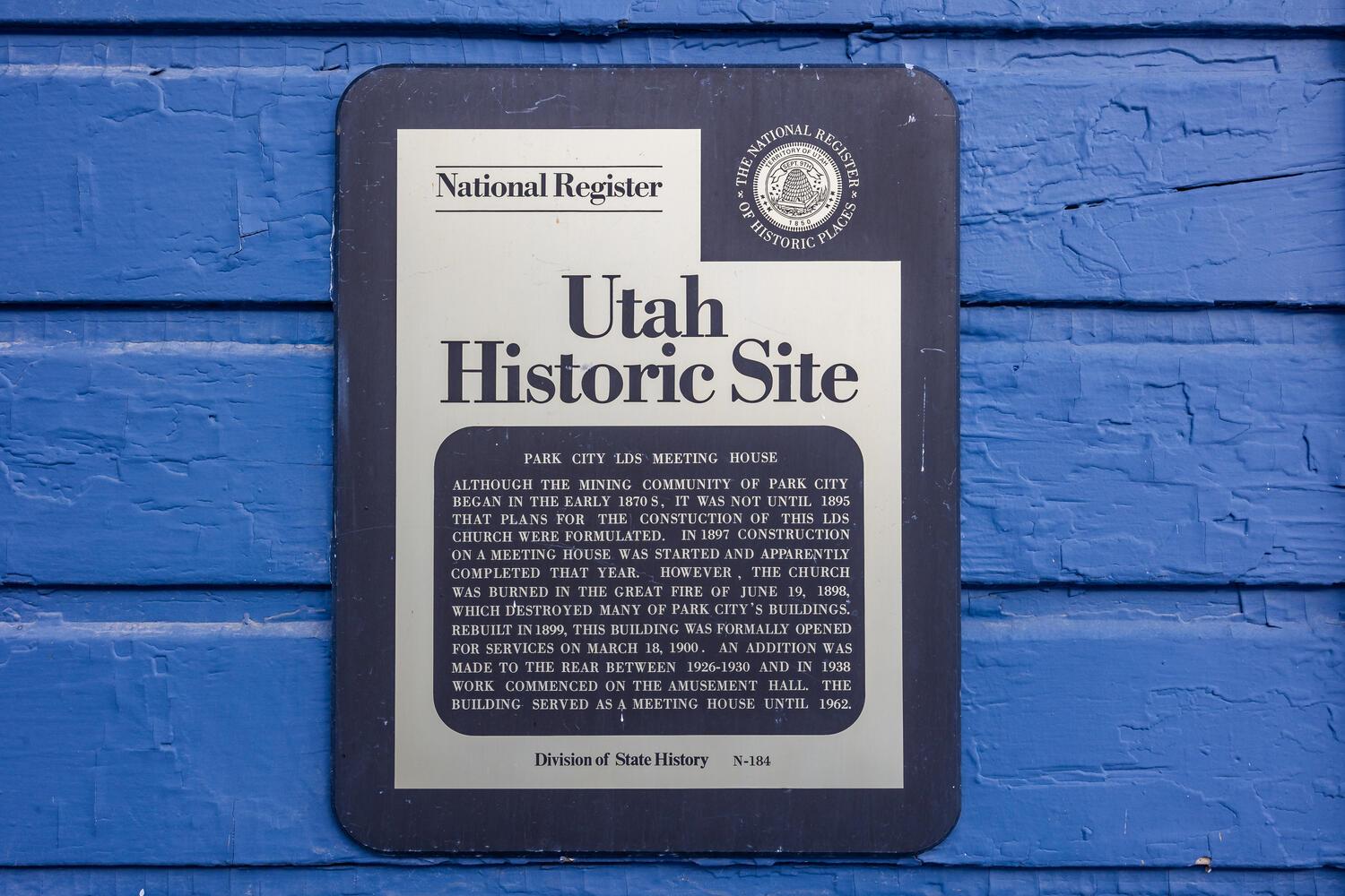 Blue Church Lodge Utah Historic Site sign attached to the building.