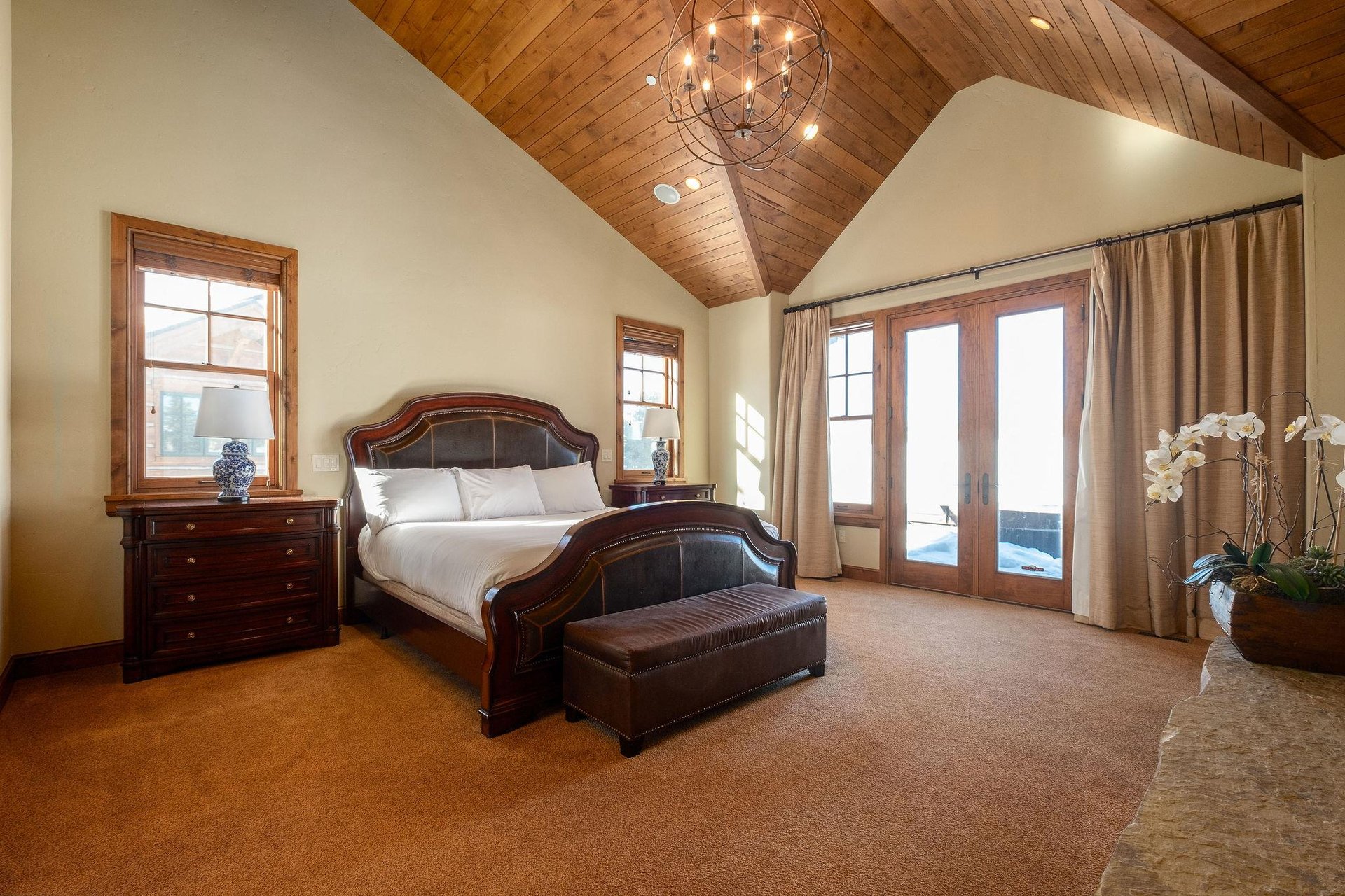 First main bedroom suite with patio access to hot tub