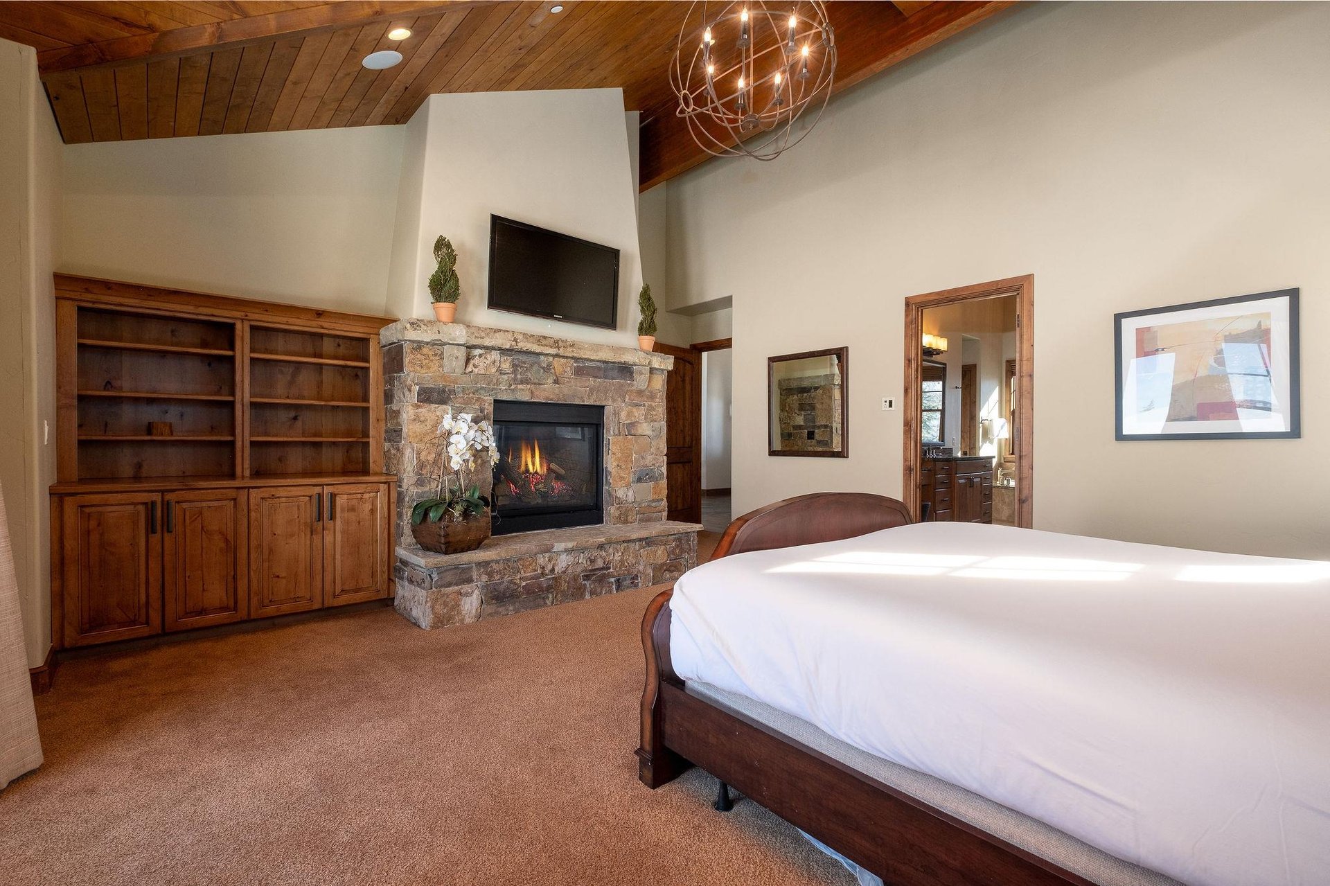 Cozy fireplace in the first main bedroom