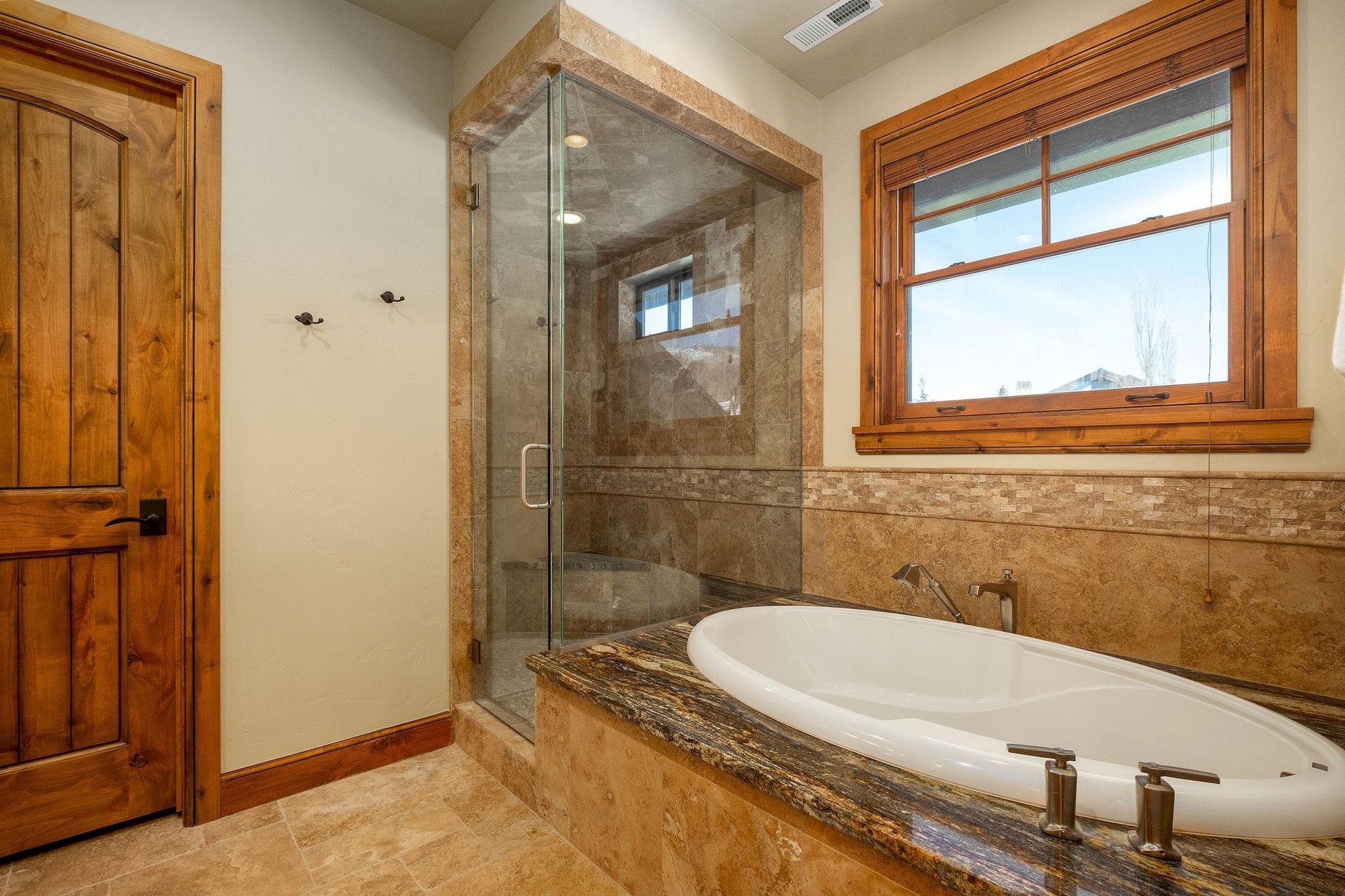 Soaking tub in the second main bathroom