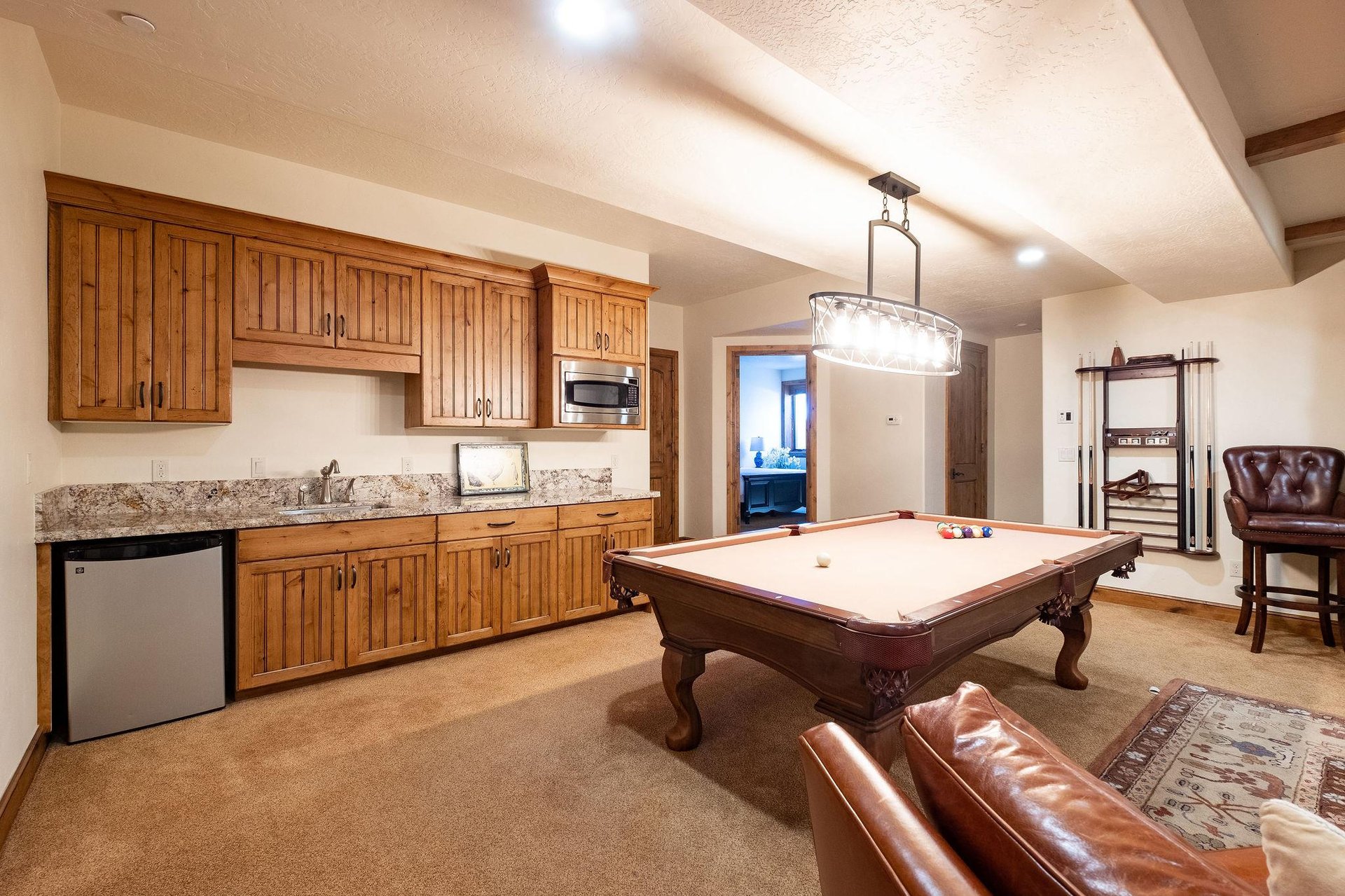 Billiards table and wet bar