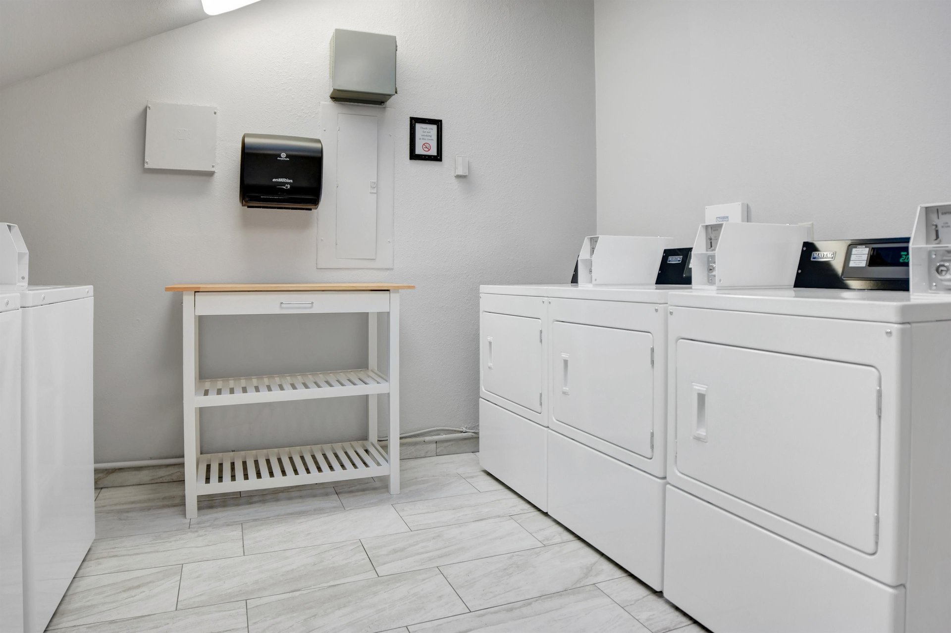 Common laundry room located on the second floor. Machines accept both coin payment and credit card via smartphone app