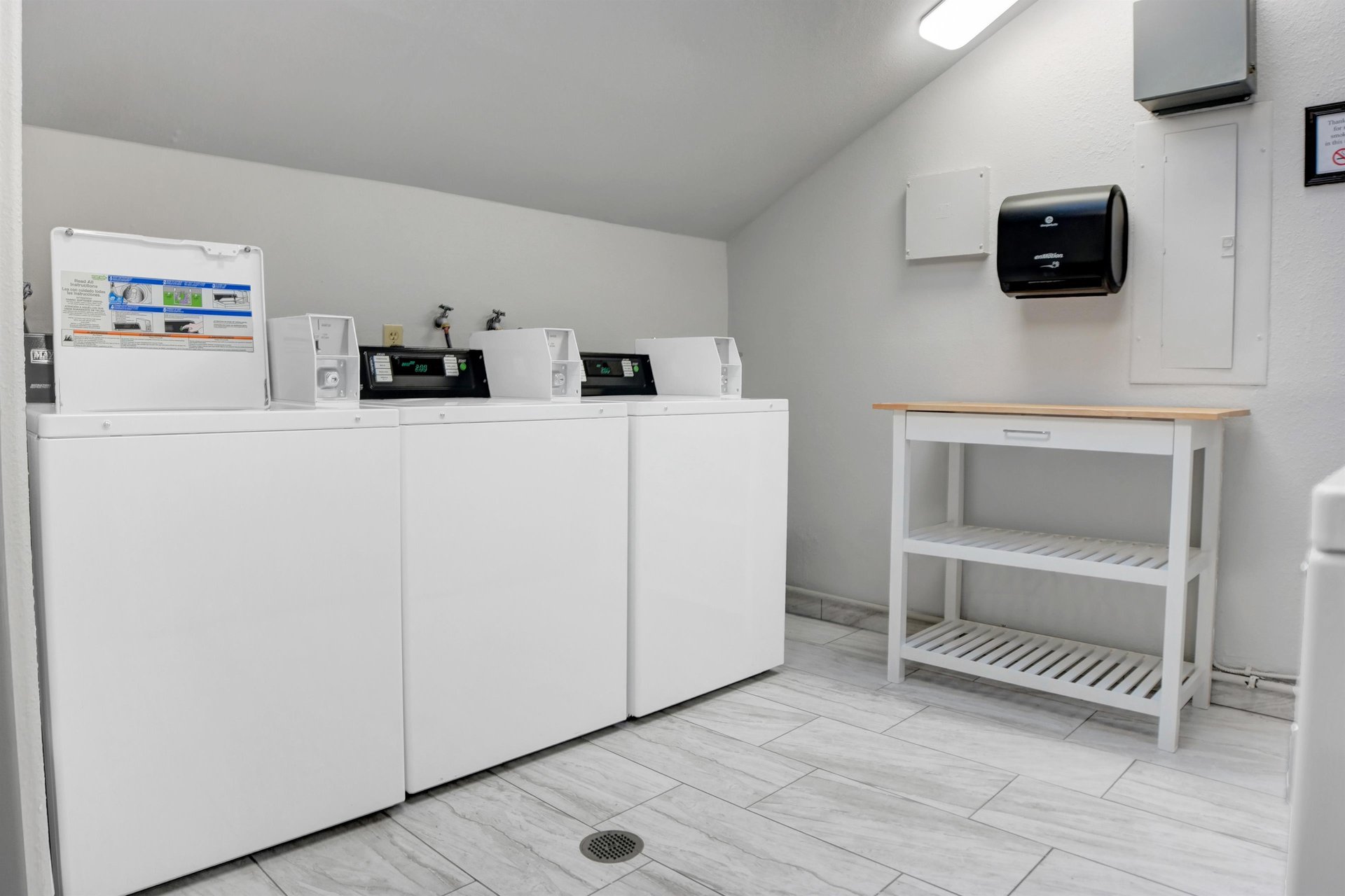 Common laundry room located on the second floor. Machines accept both coin payment and credit card via smartphone app