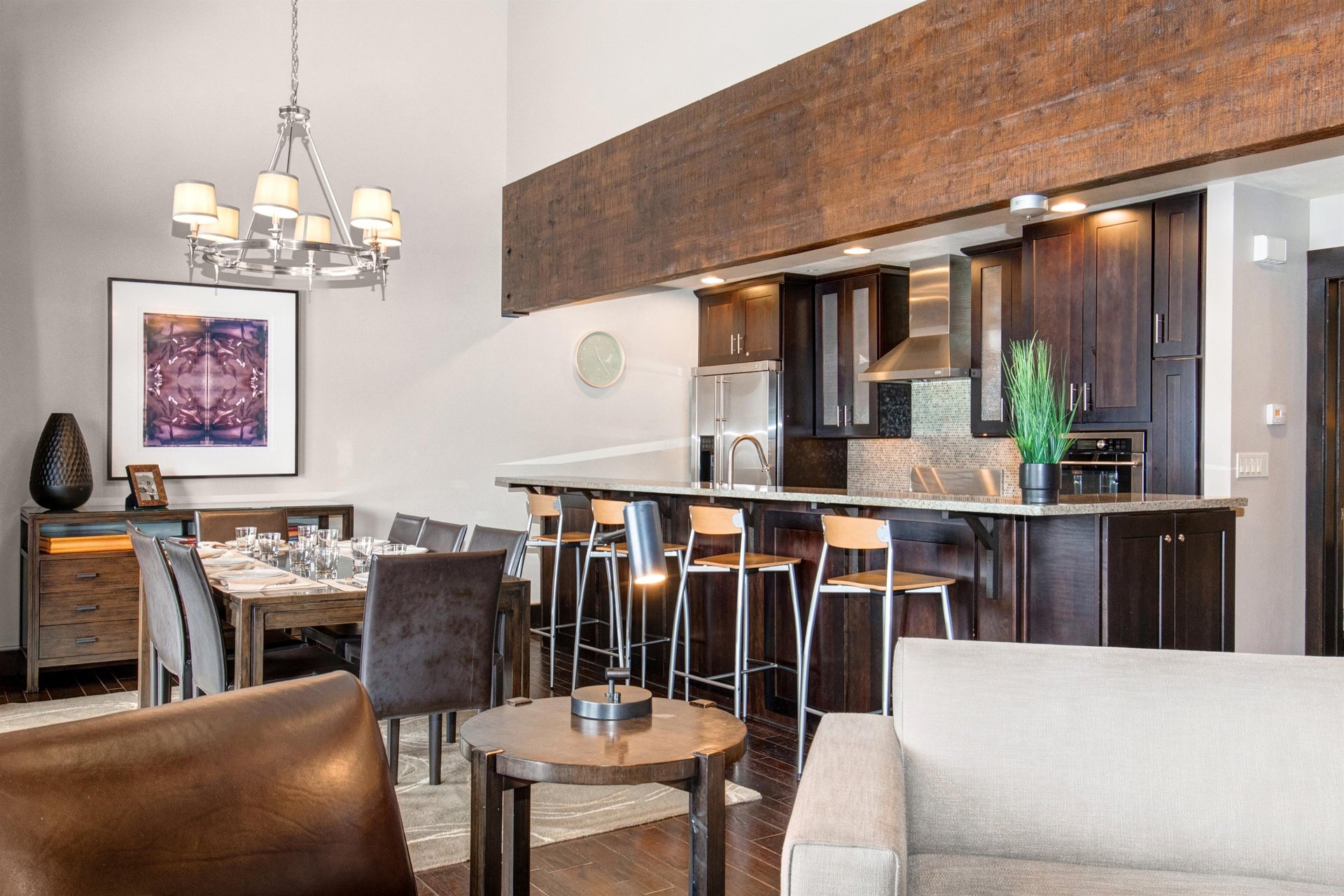 The dining area and open concept kitchen with island.