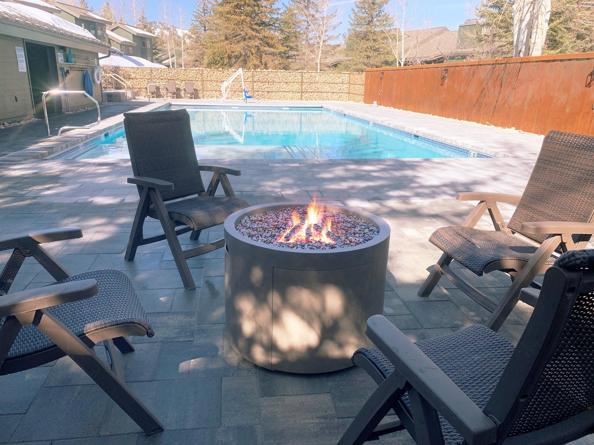 The firepit and sitting area next to the Lakeside pool