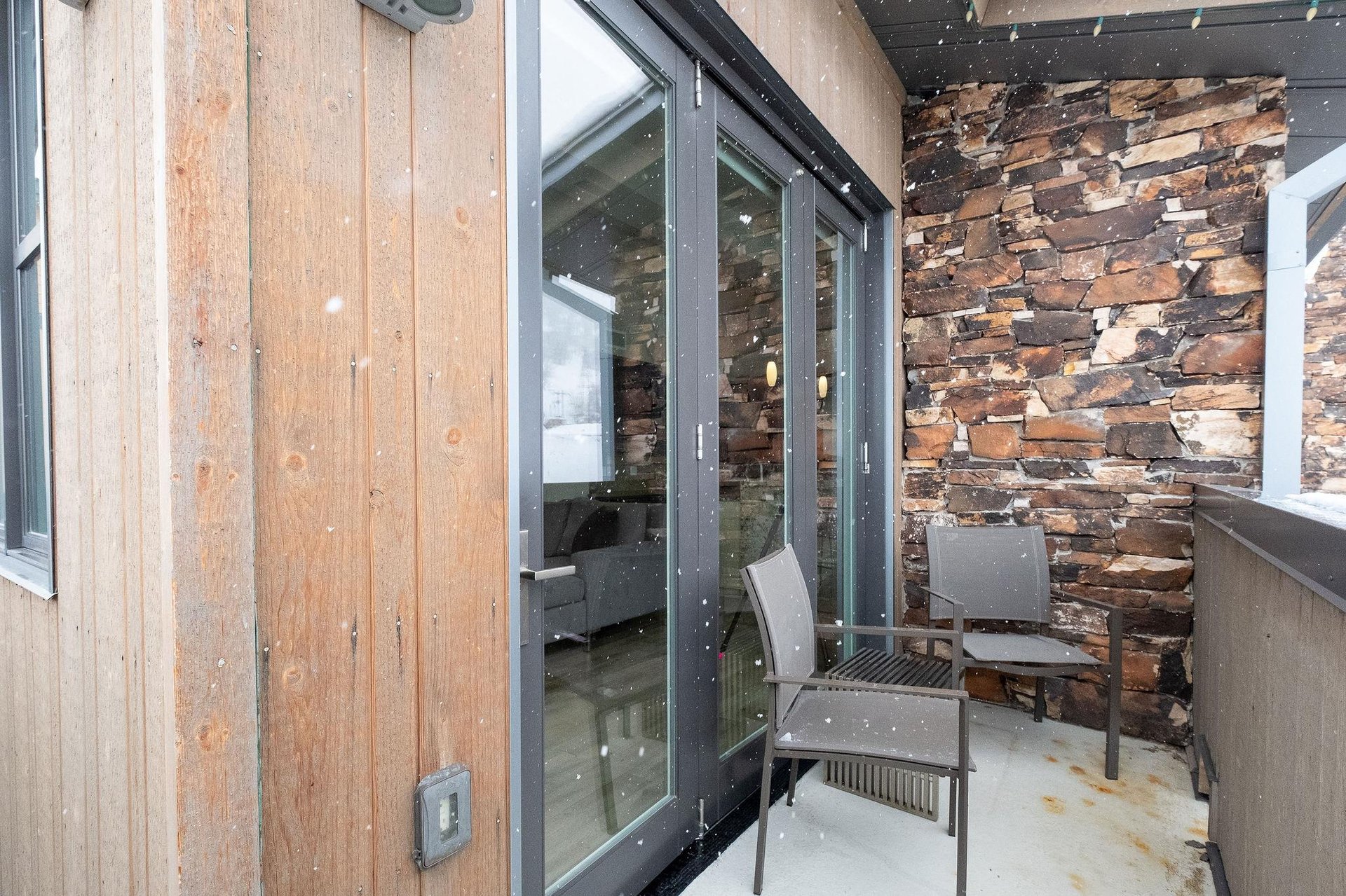 Private patio is heated in the wintertime to watch the peaceful snowfall