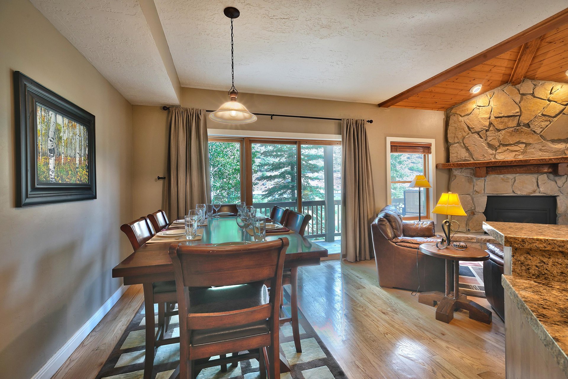 Dining room with solid wood table and seating for 6 adjacent the living room