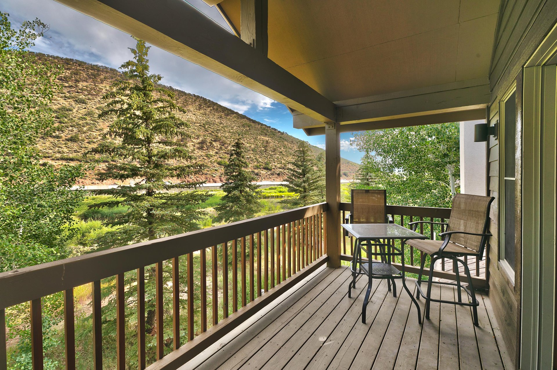 Top Floor Main bedroom suite private patio with bistro seating for 2