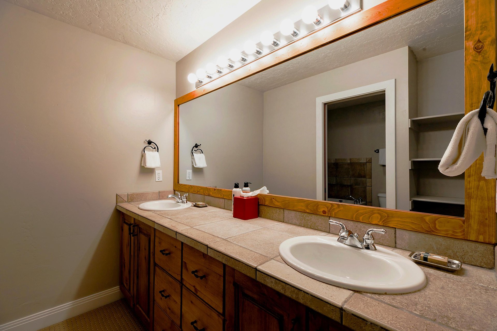 Ensuite main bedroom bath, double vanity and oversized vanity mirror