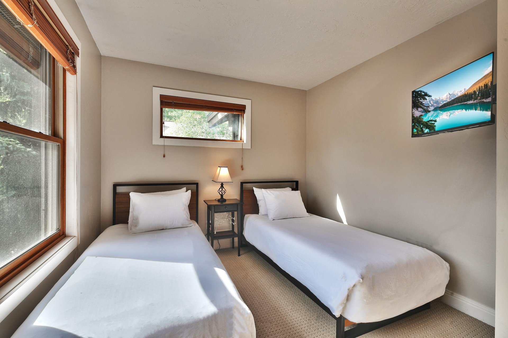 Twin beds can be made into a king bed with advanced notice, wall mounted flat screen TV