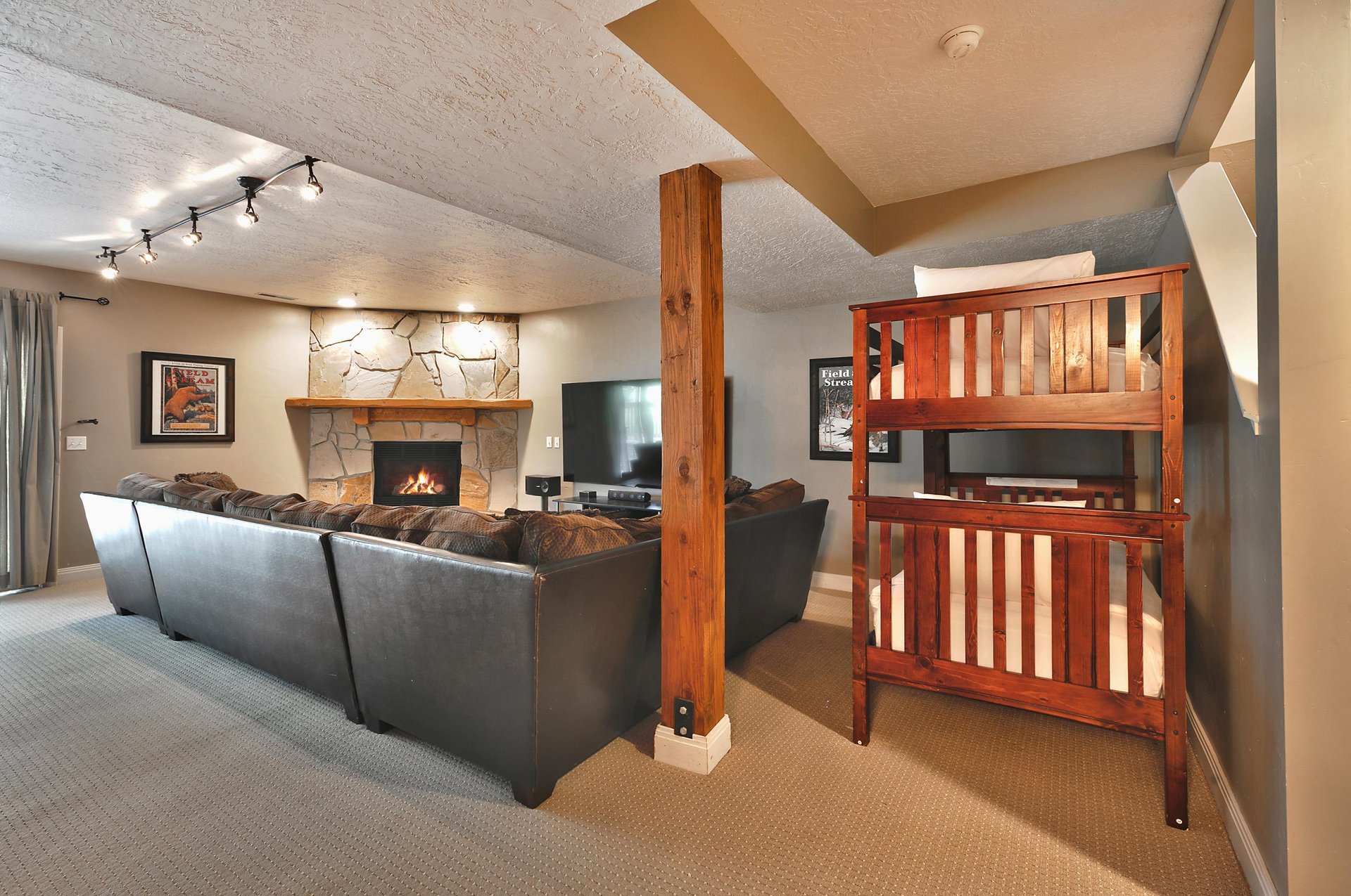 Wood frame twin bunk beds in the den