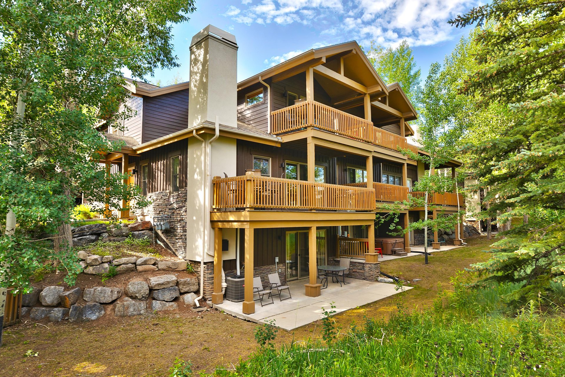 Secluded townhome surrounded by aspens, firs, and pine trees