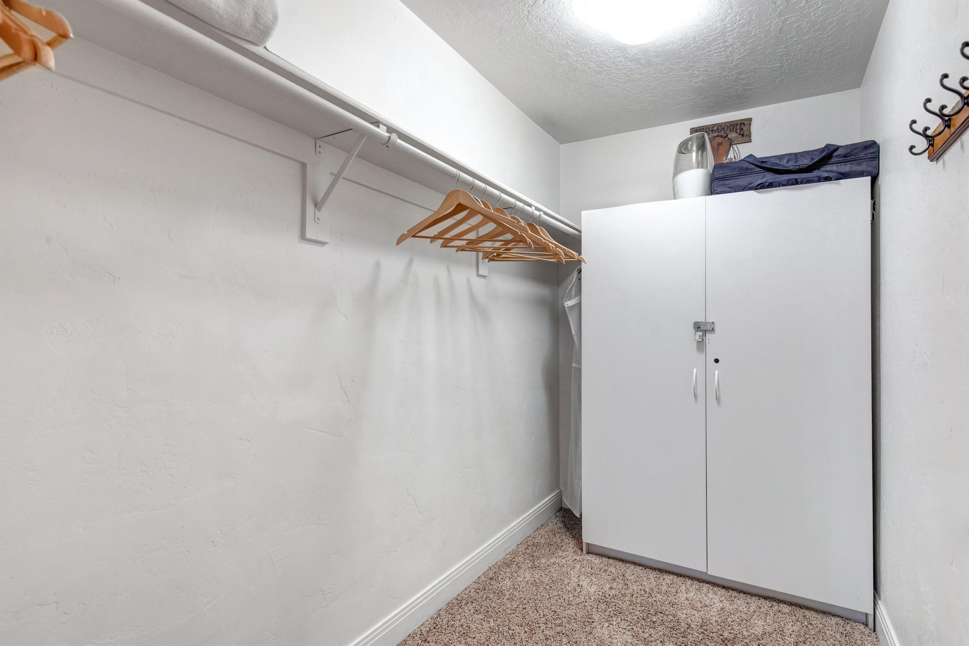 Unpack and settle right in with dedicated closet space, wallmounted hangers, and plenty of room to make this spot your own during your stay.