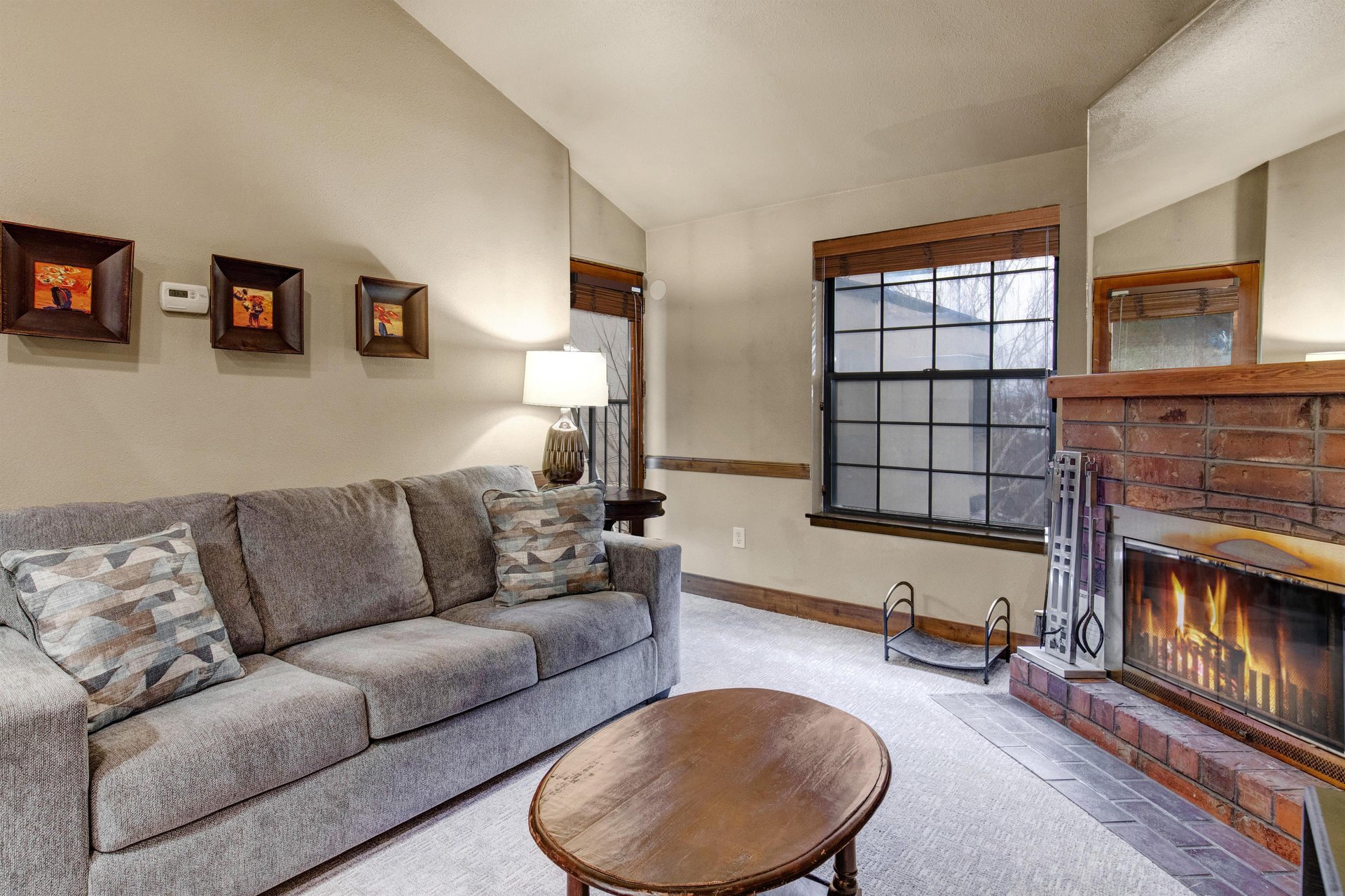 Curl up on your plush sofa beside the crackling fireplace.