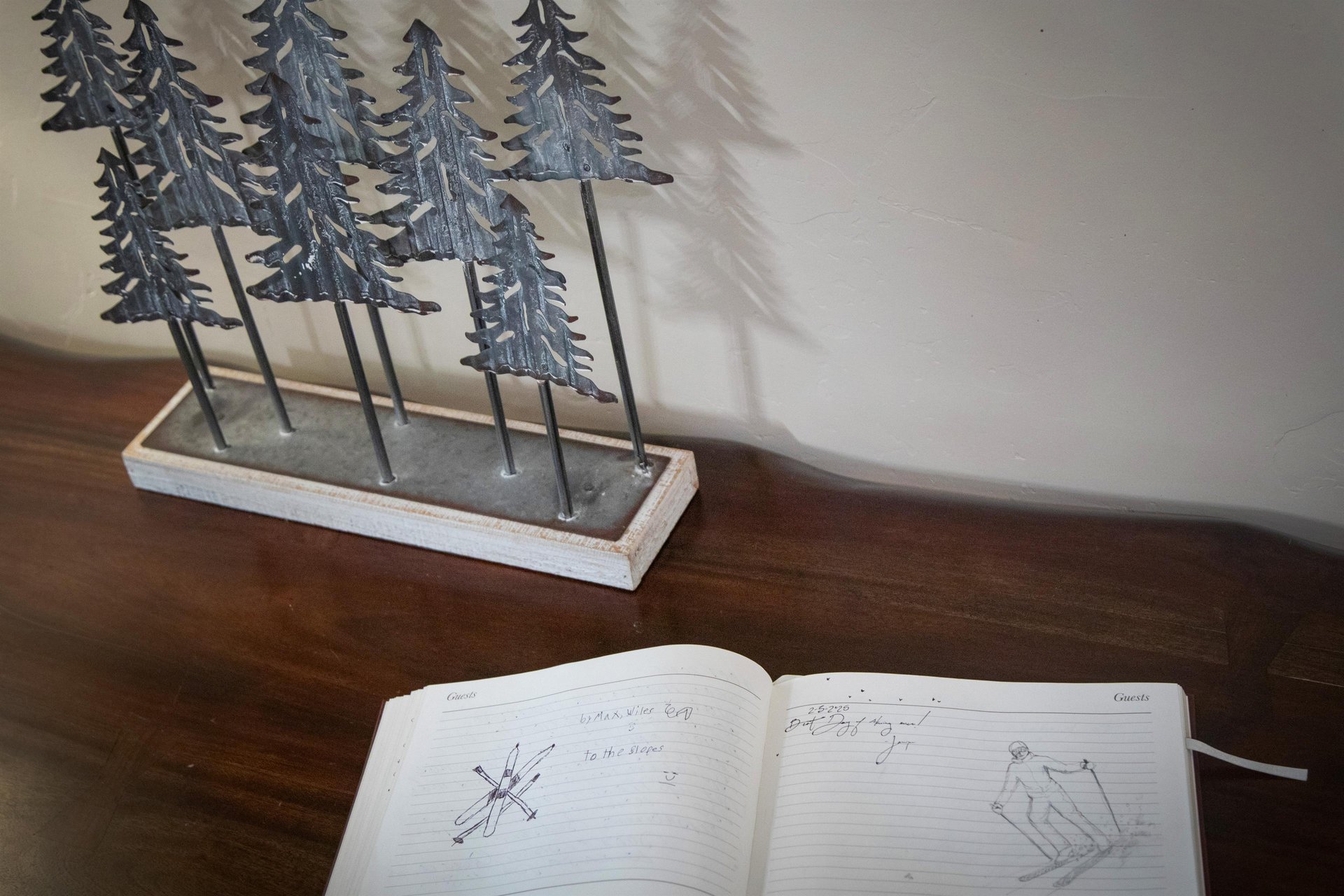 Fun guest book for the visitors to sign, cute ski sketches were drawn by a previous guest