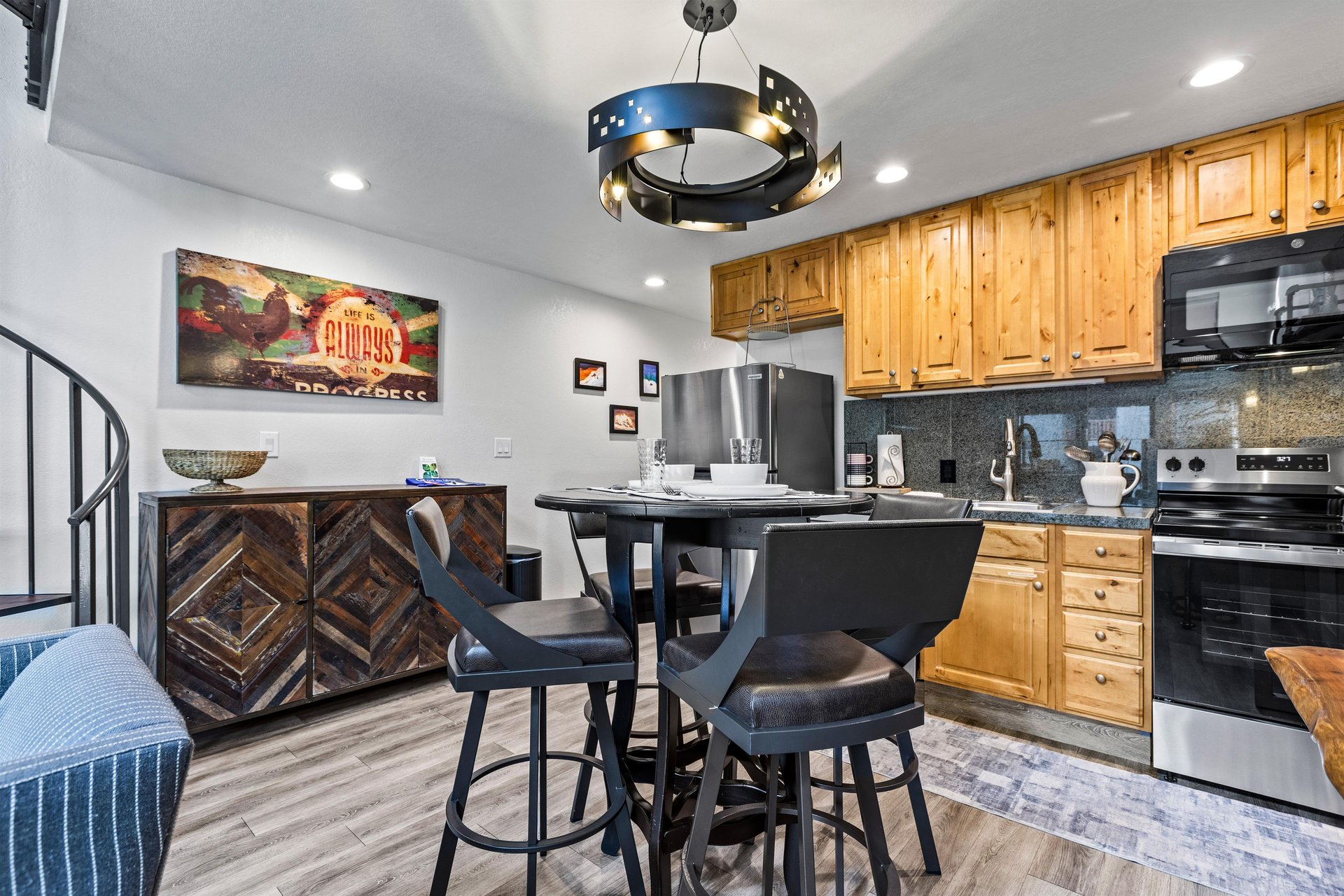 Snowcrest 302 has a bar height dining table with seating for 4 guests.