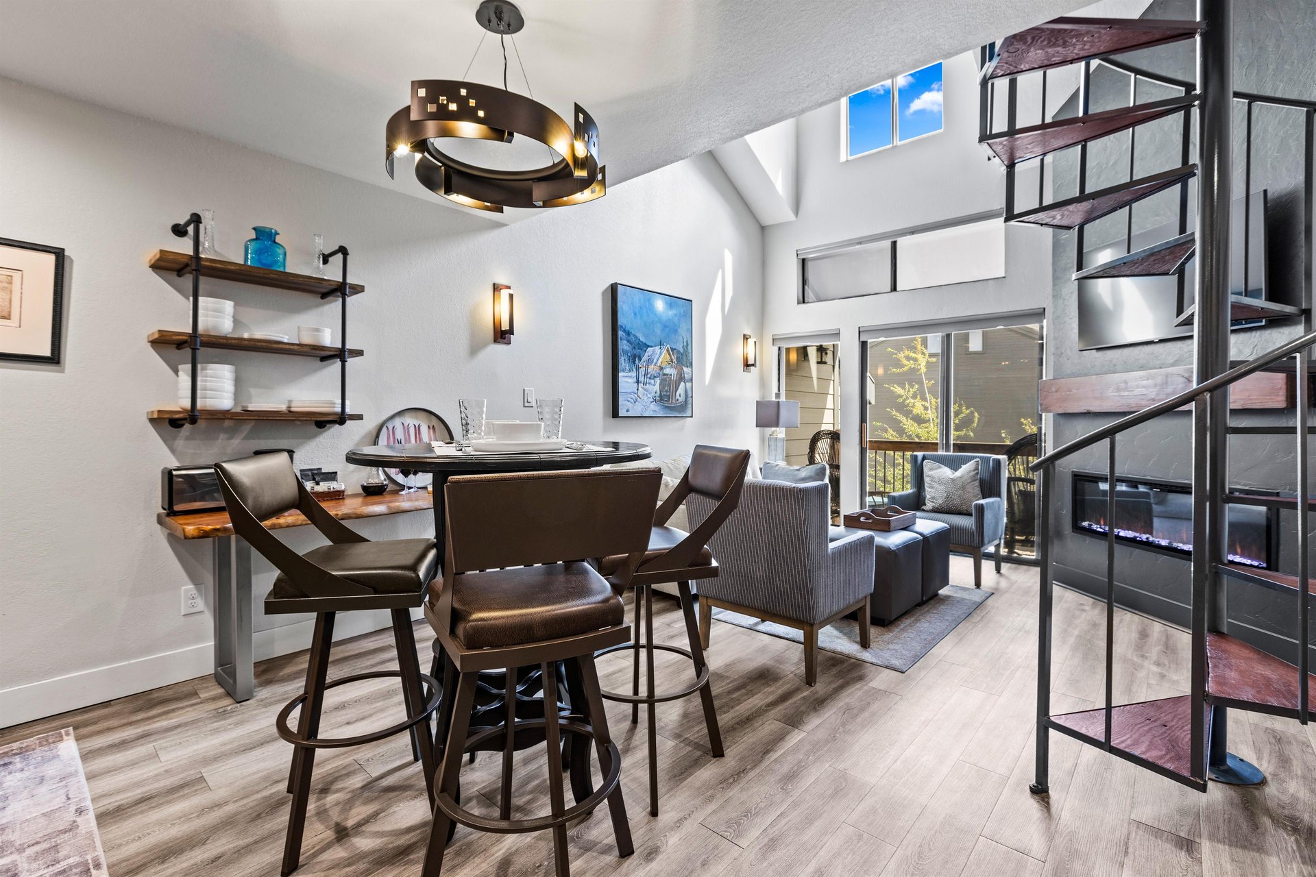 The open concept kitchen, dining, and living area.