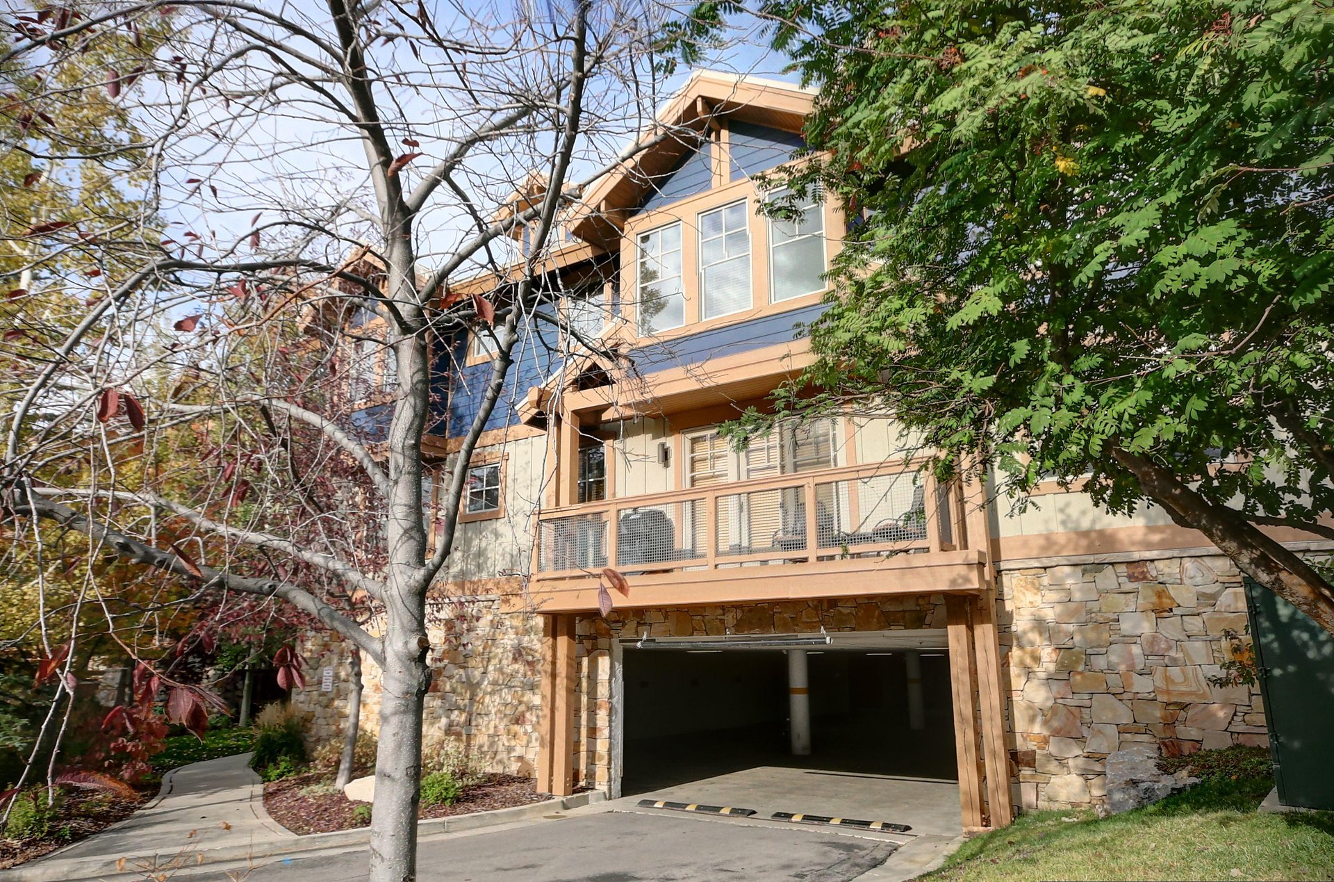 Town Pointe exterior in the summer time and the entrance to the parking garage.