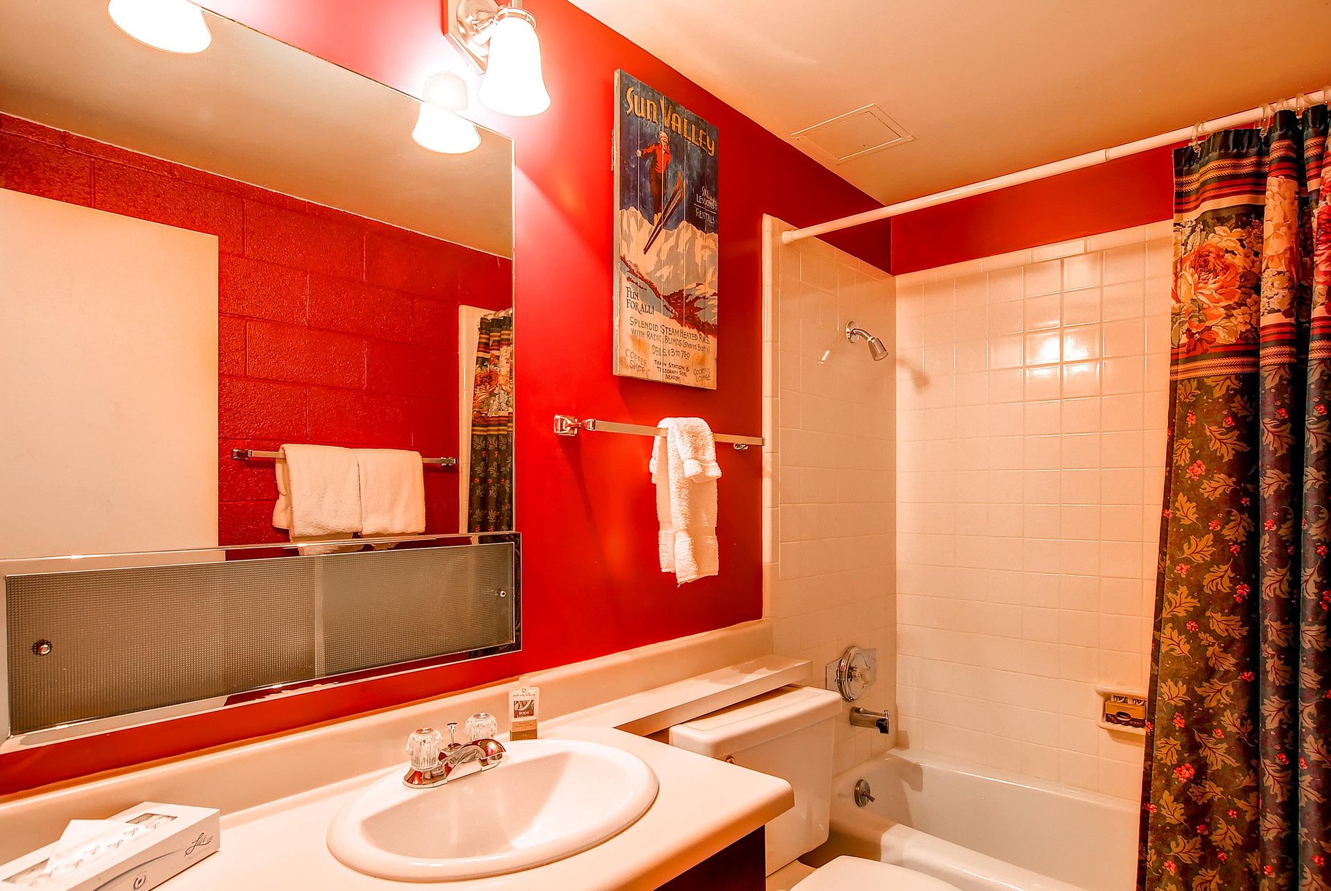 The full bathroom with a bathtub and shower combination.