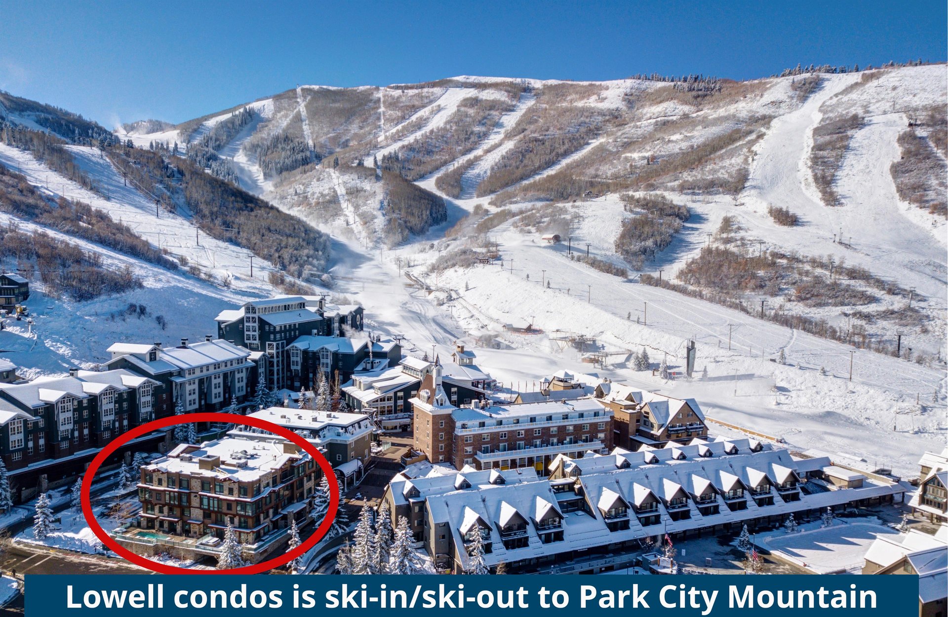 Aerial winter view showing Lowell Condominiums at the base of Park City Mountain near the ski slopes.