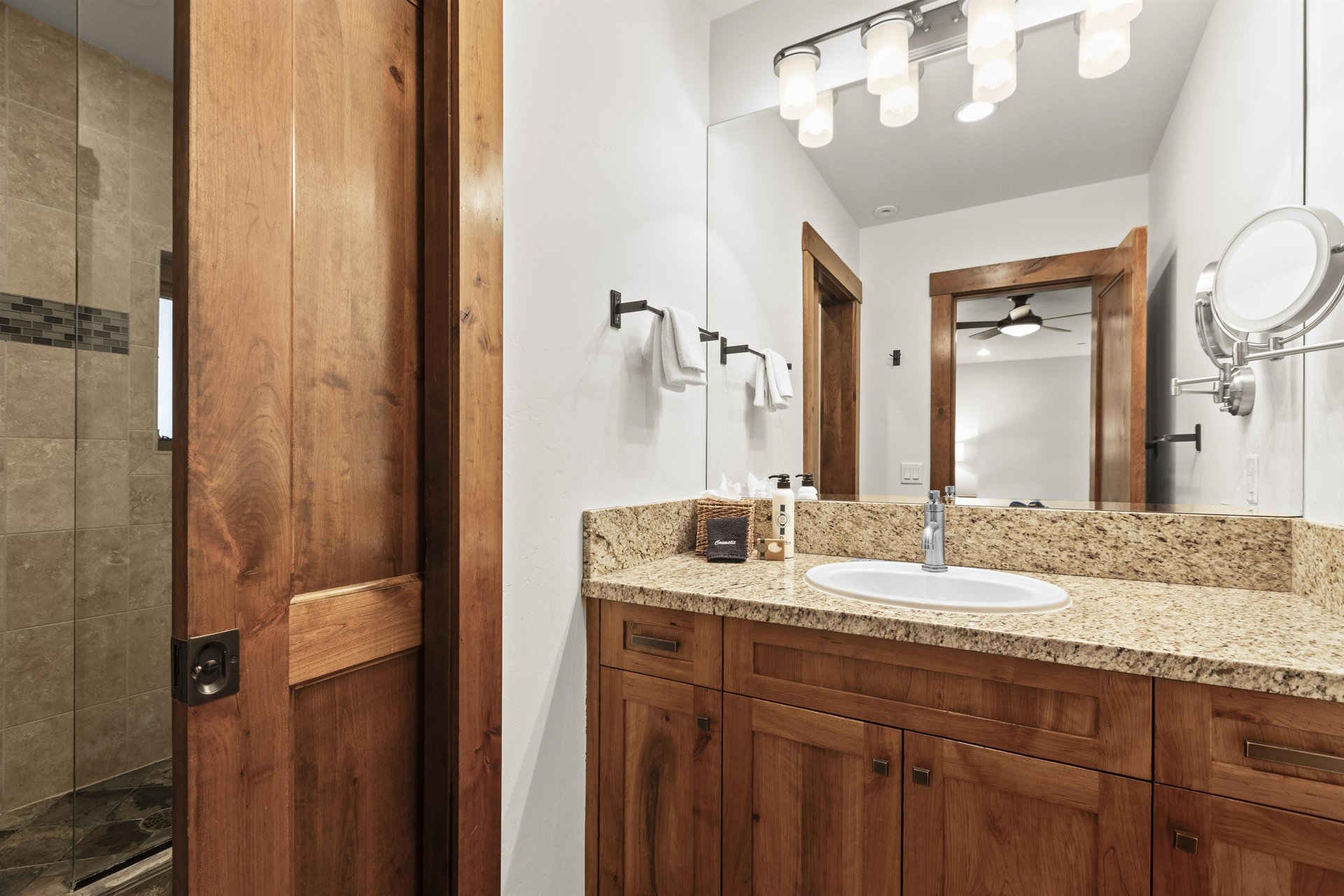The main suite has an en suite bathroom with one sink granite vanity and separate water closet.