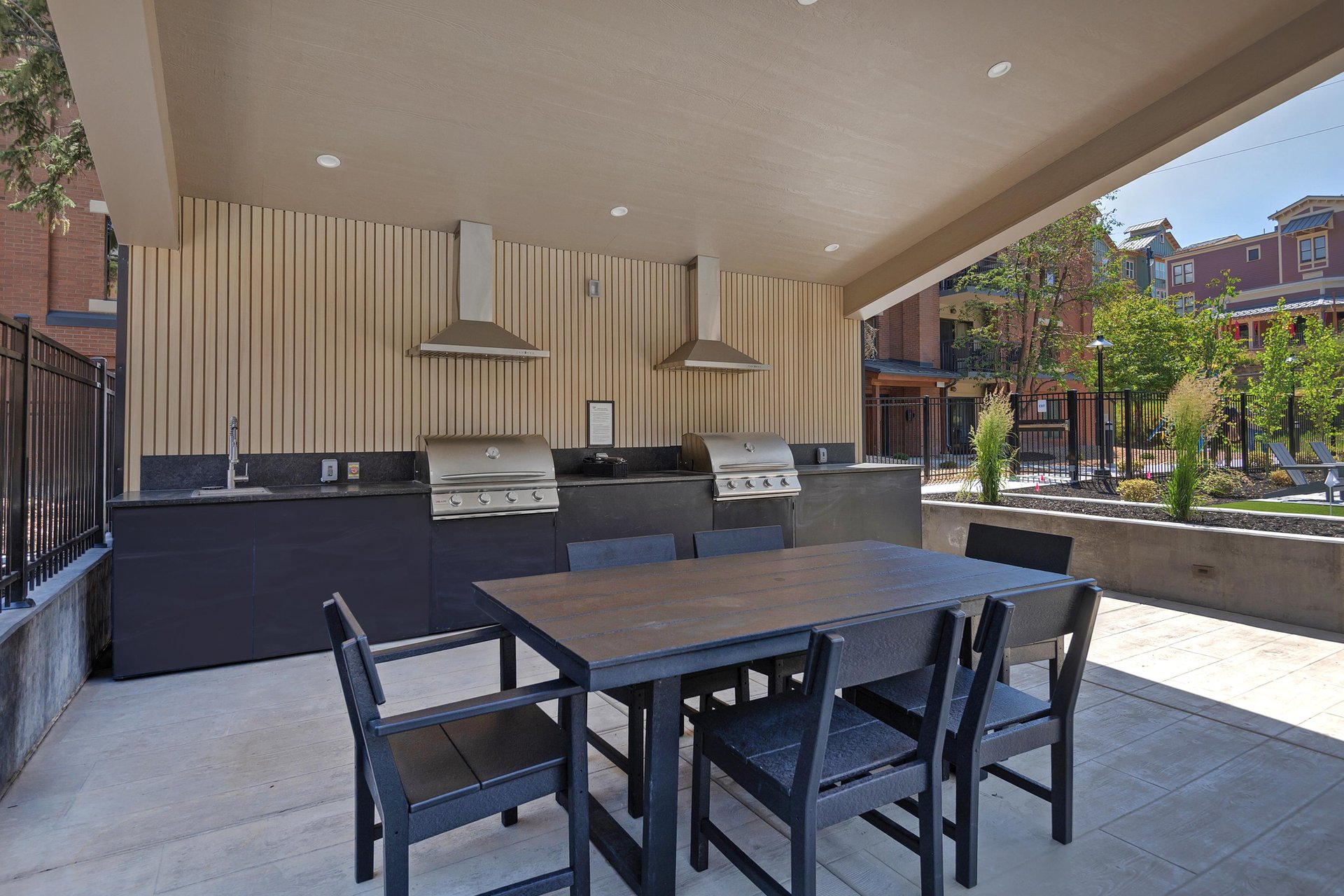 Outdoor covered BBQ and seating area