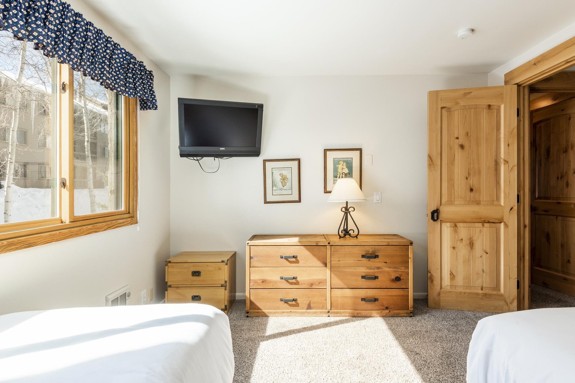 Guest  bedroom with abundant natural light