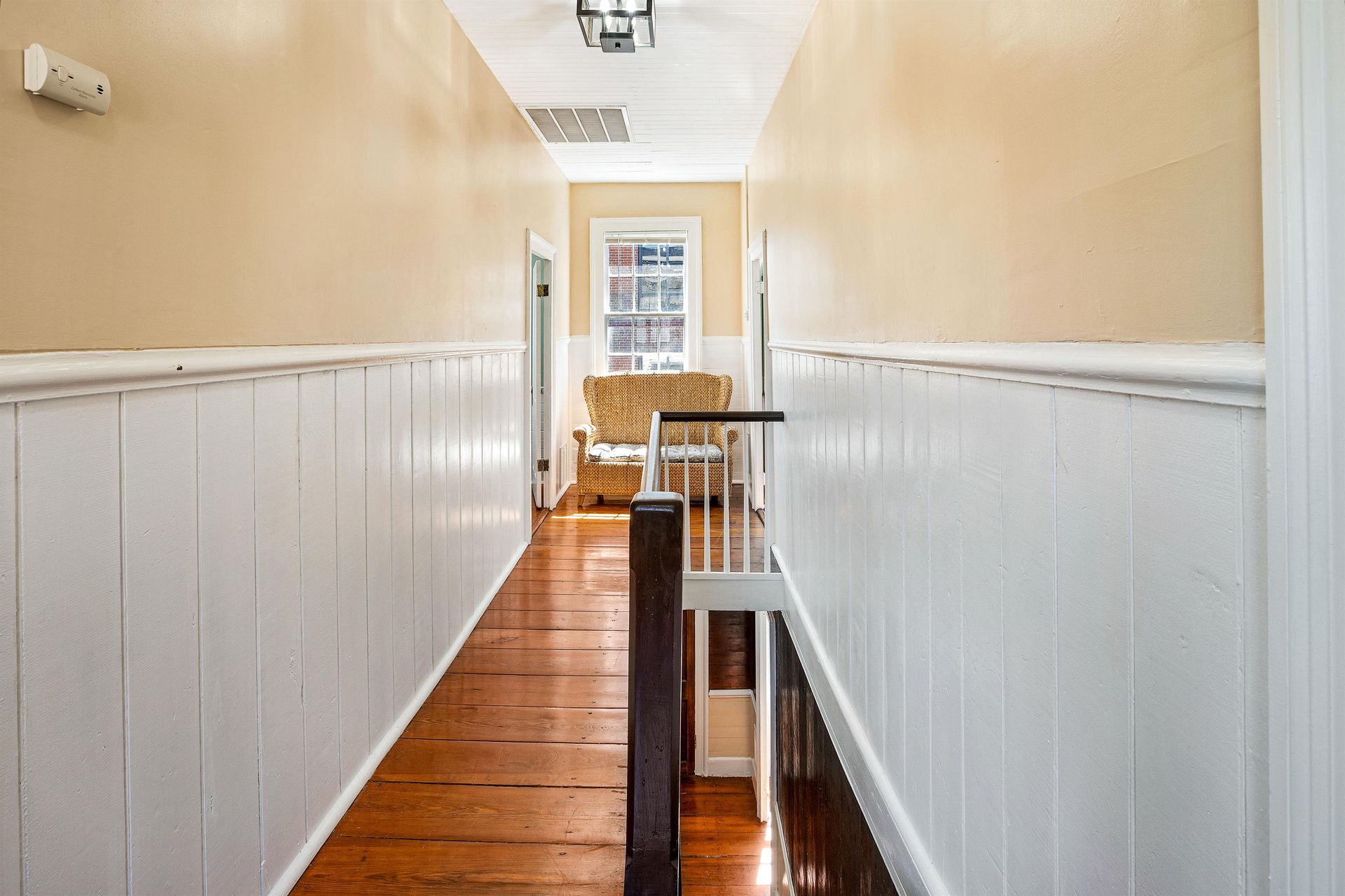 Head upstairs to find the additional three bedrooms.