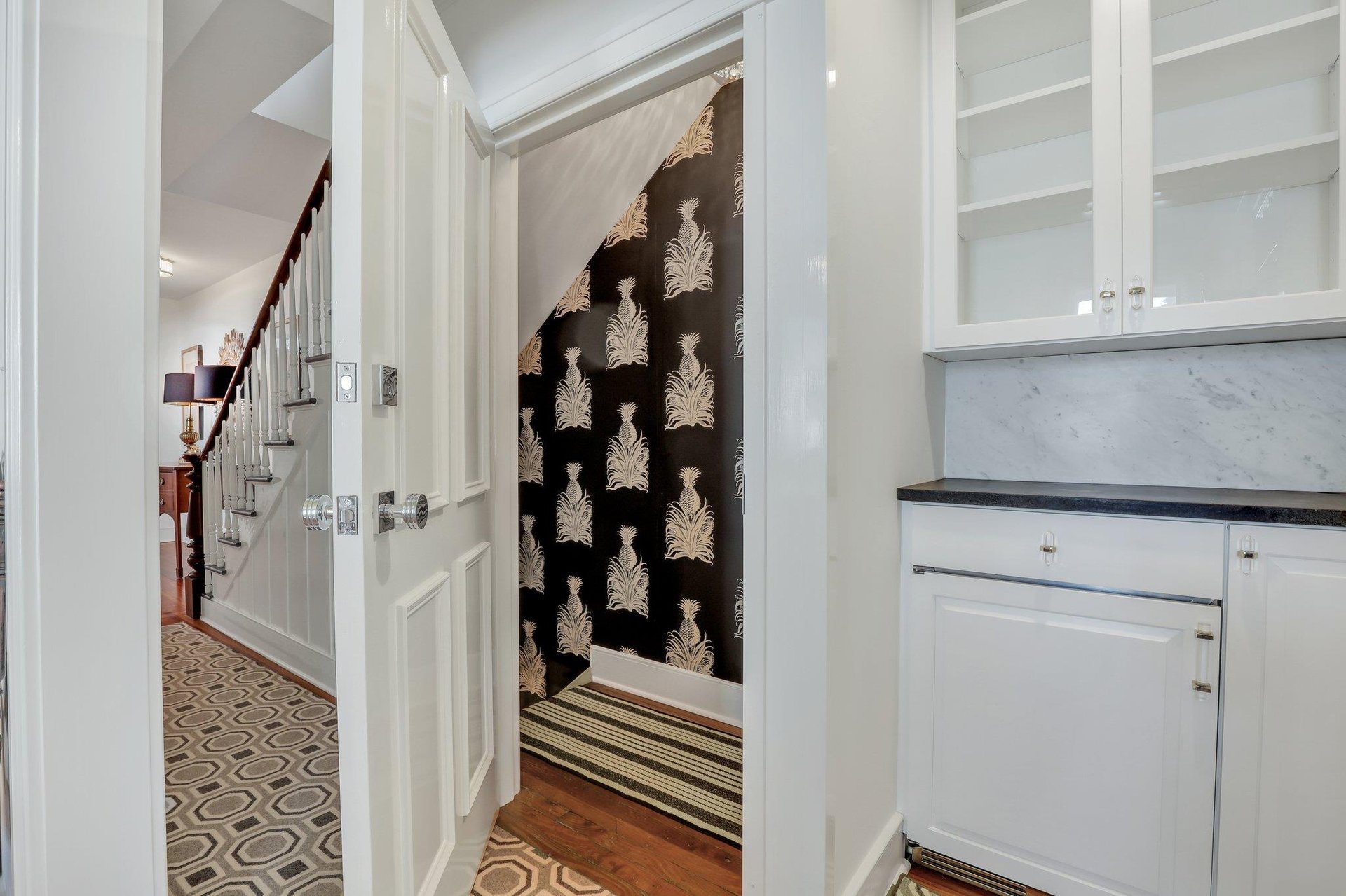Head downstairs to find the fourth bedroom in the studio apartment.