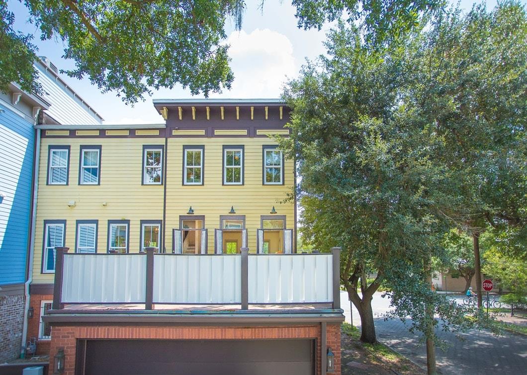 Back of the home with private deck over your garage.