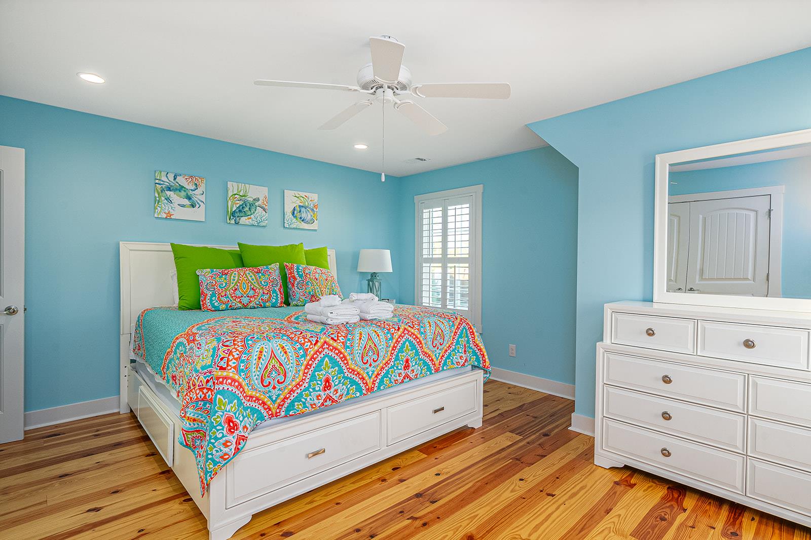 The second guest room features a King bed with an ample amount of storage.