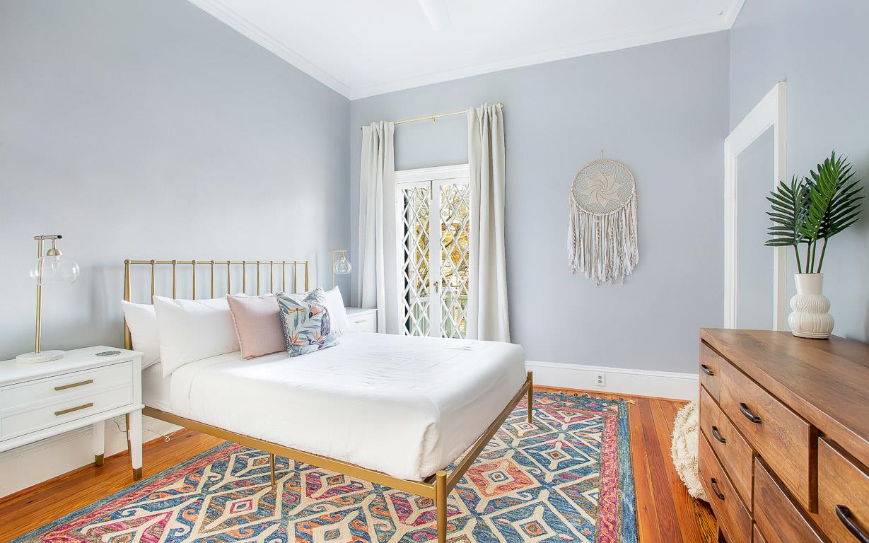 The first bedroom offers a queen size bed, with a full size dresser and closet.