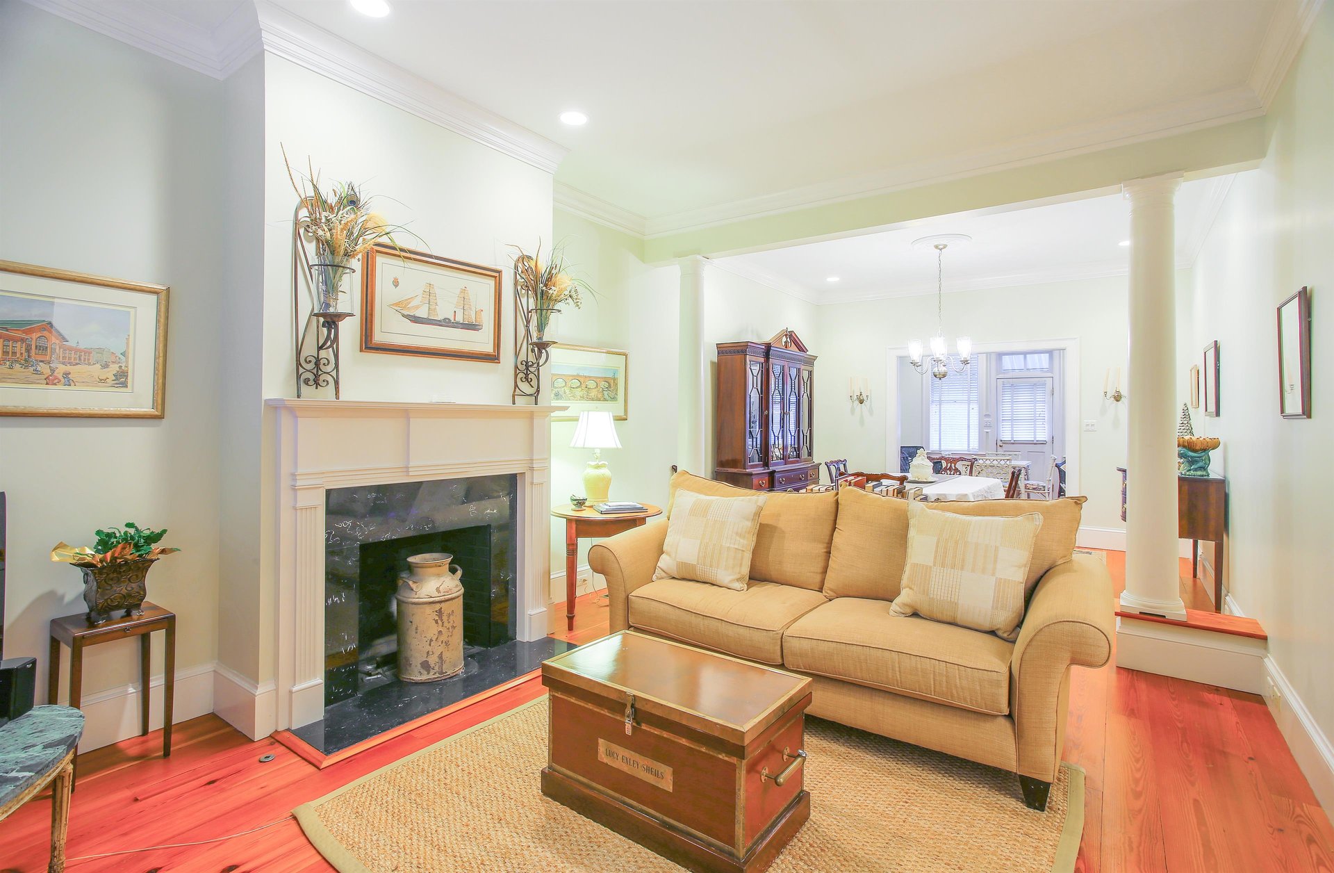 The tastefully decorated living room also features a flat screen television.