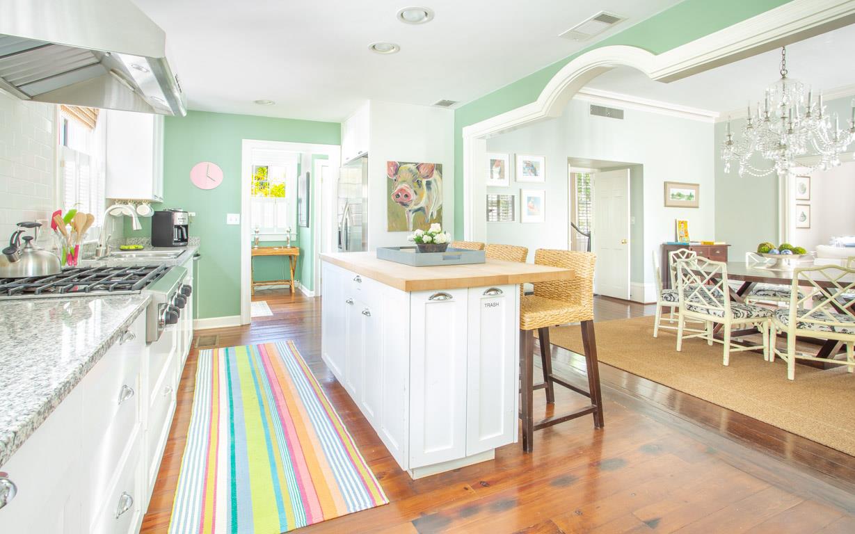 The kitchen opens up to the dining room.