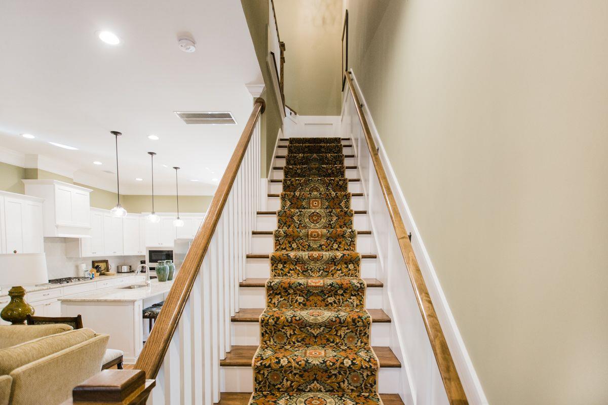 Head upstairs, and send your luggage up via elevator.